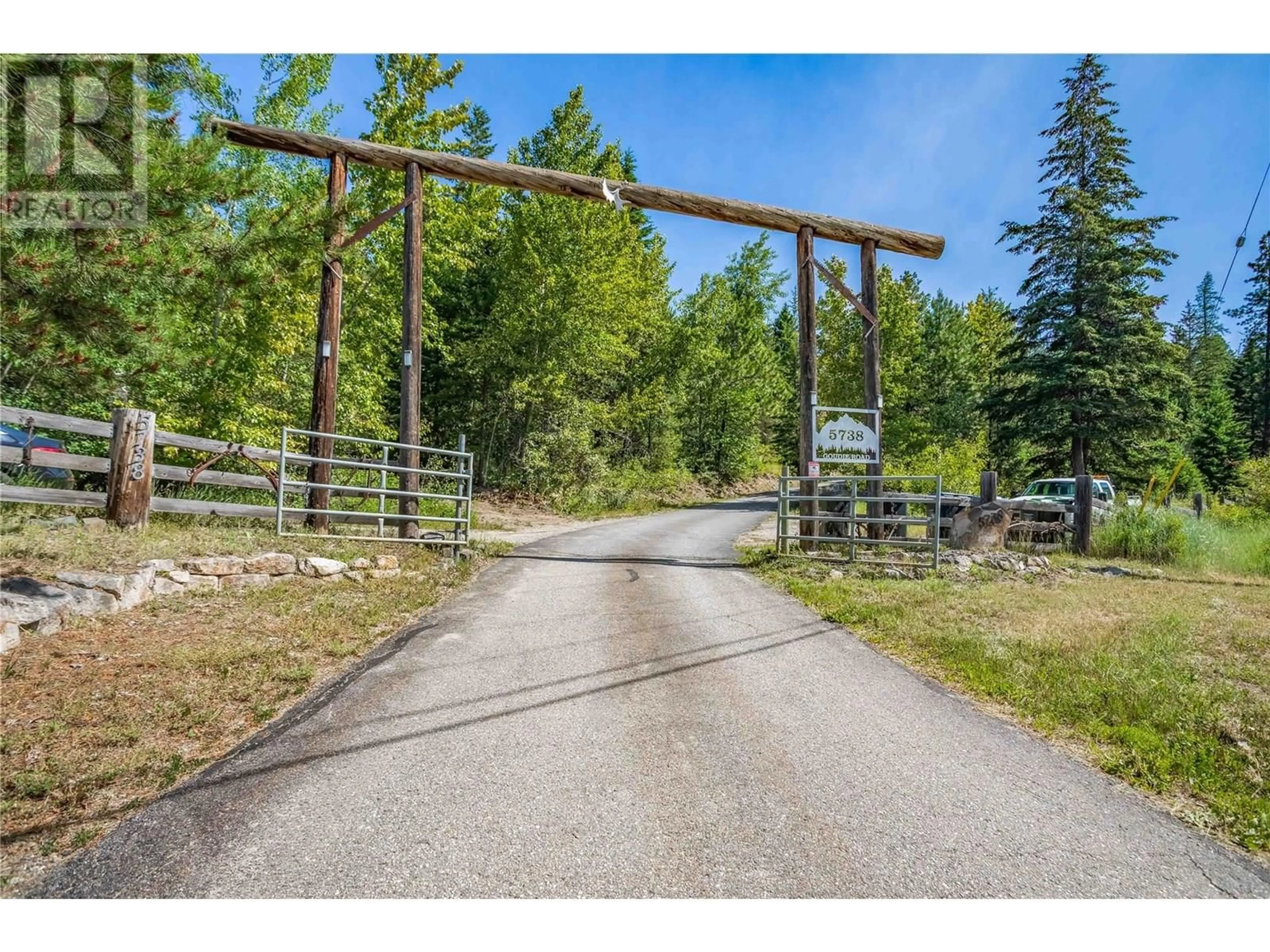 A pic from outside/outdoor area/front of a property/back of a property/a pic from drone, forest/trees view for 5738 GOUDIE ROAD, Kelowna British Columbia V1P1M4