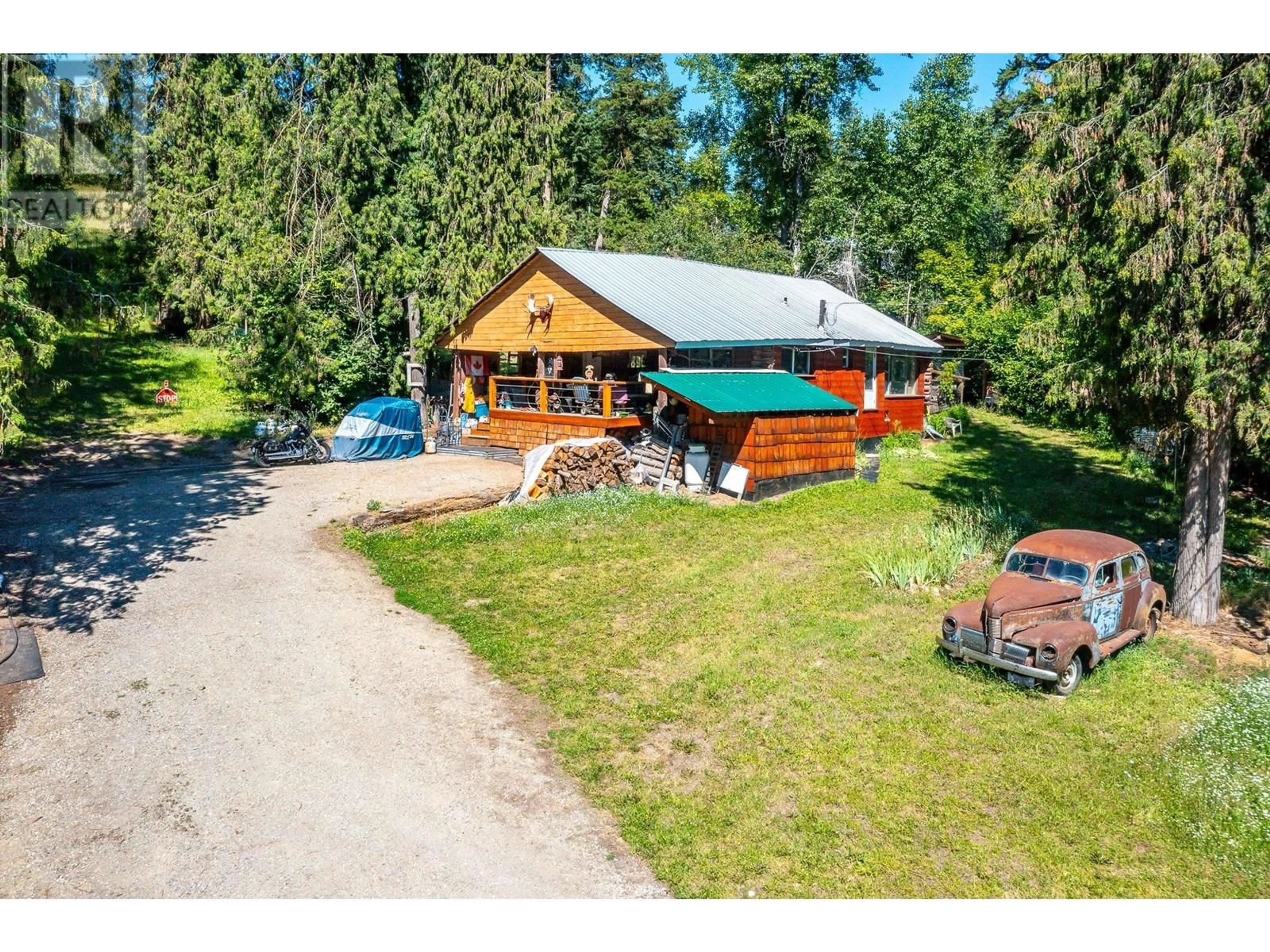 A pic from outside/outdoor area/front of a property/back of a property/a pic from drone, water/lake/river/ocean view for 136 97B HIGHWAY, Enderby British Columbia V4Y4G7