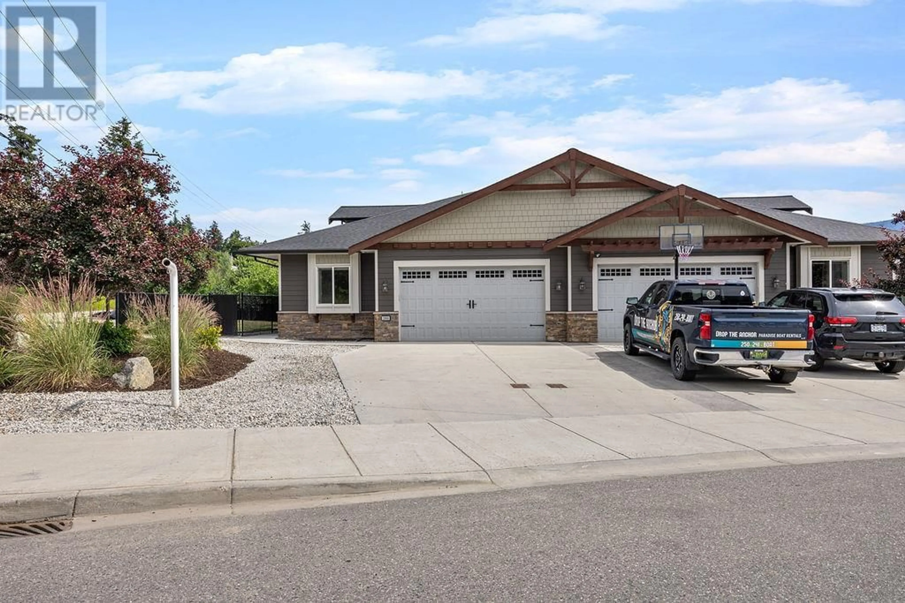 Home with vinyl exterior material, street for 3988 MCKECHNIE DRIVE, Armstrong British Columbia V0E1B4