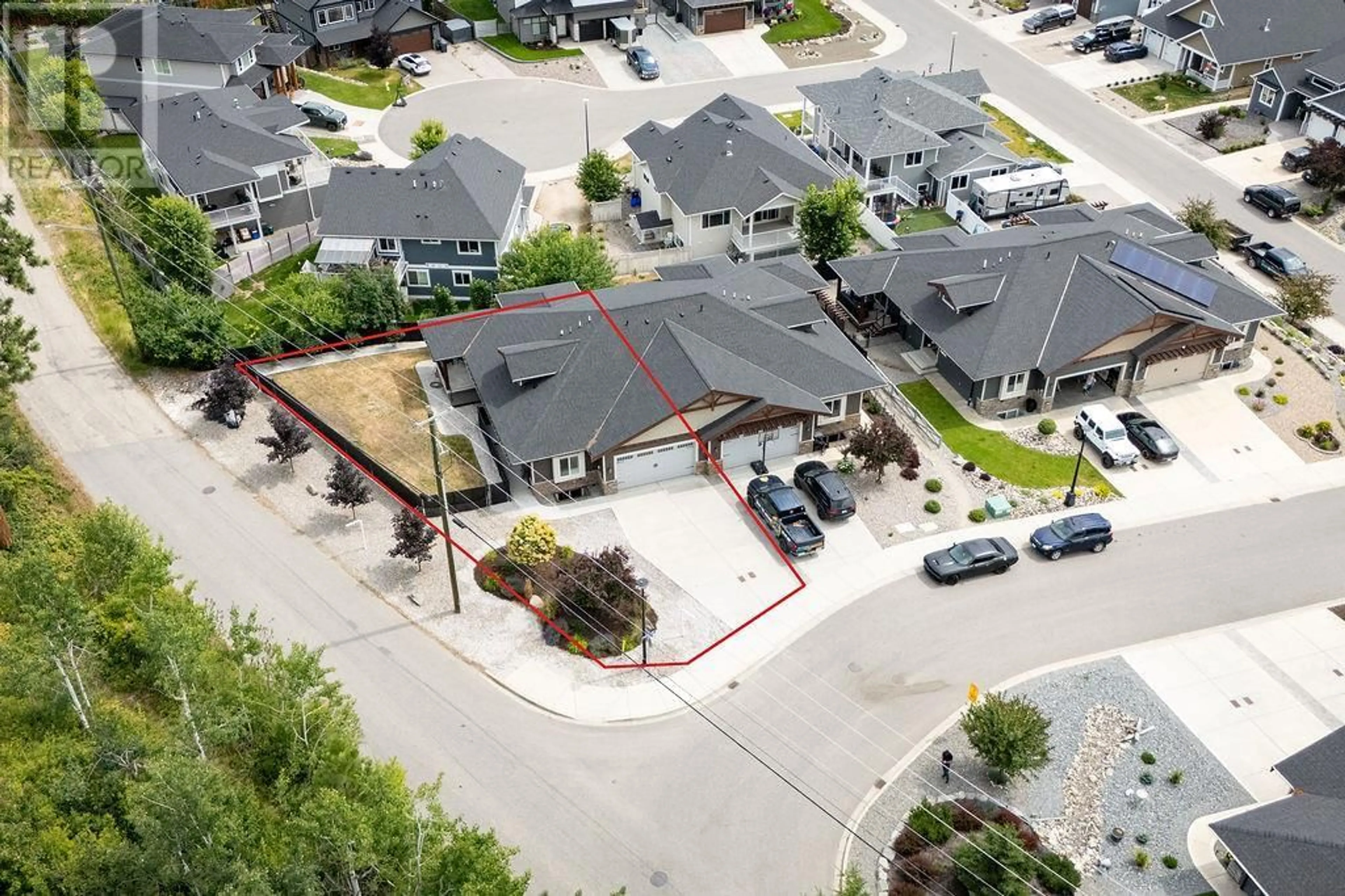 A pic from outside/outdoor area/front of a property/back of a property/a pic from drone, street for 3988 MCKECHNIE DRIVE, Armstrong British Columbia V0E1B4
