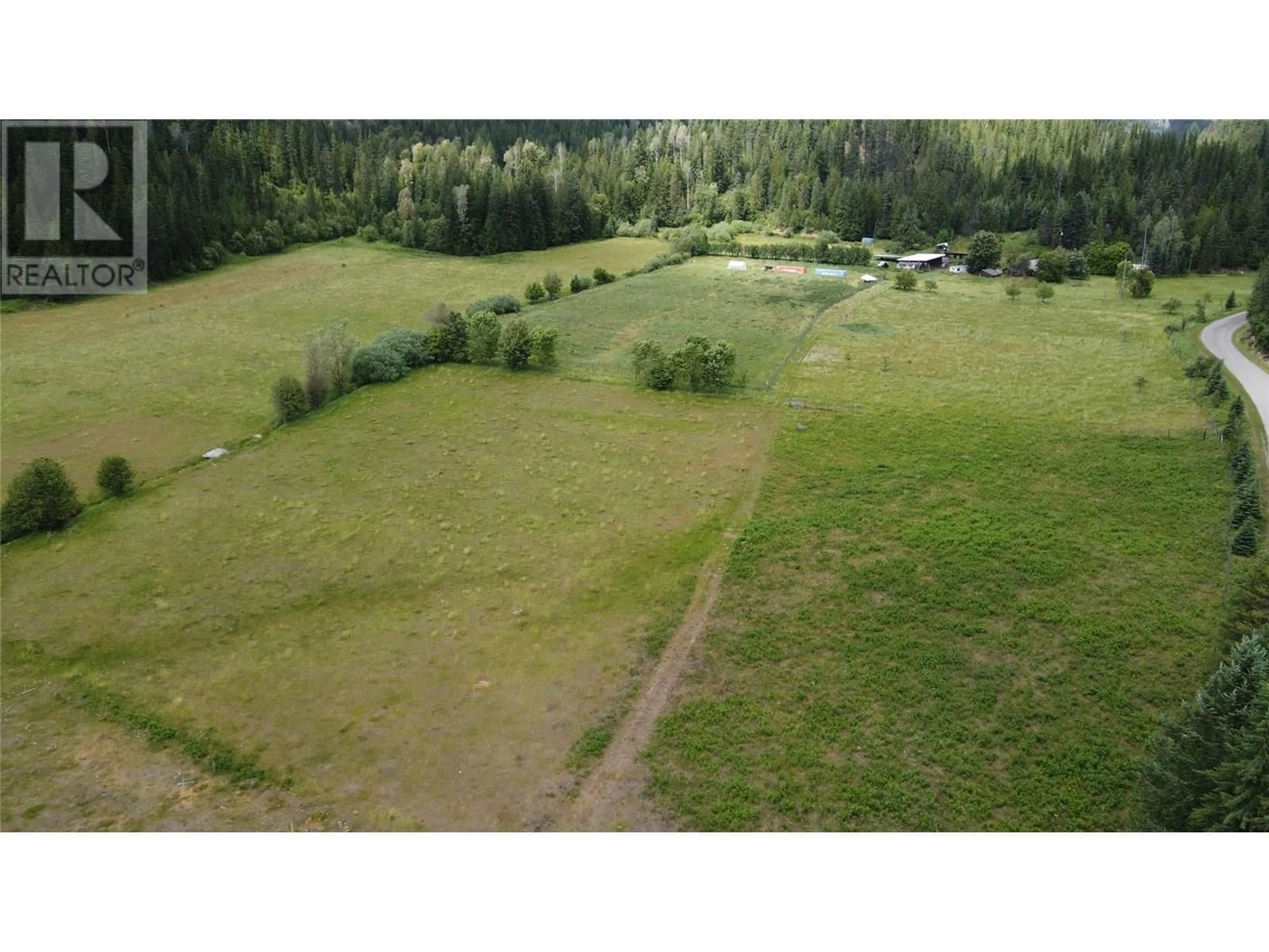 A pic from outside/outdoor area/front of a property/back of a property/a pic from drone, forest/trees view for 5795 KASLO SOUTH ROAD, Kaslo British Columbia V0G1M0