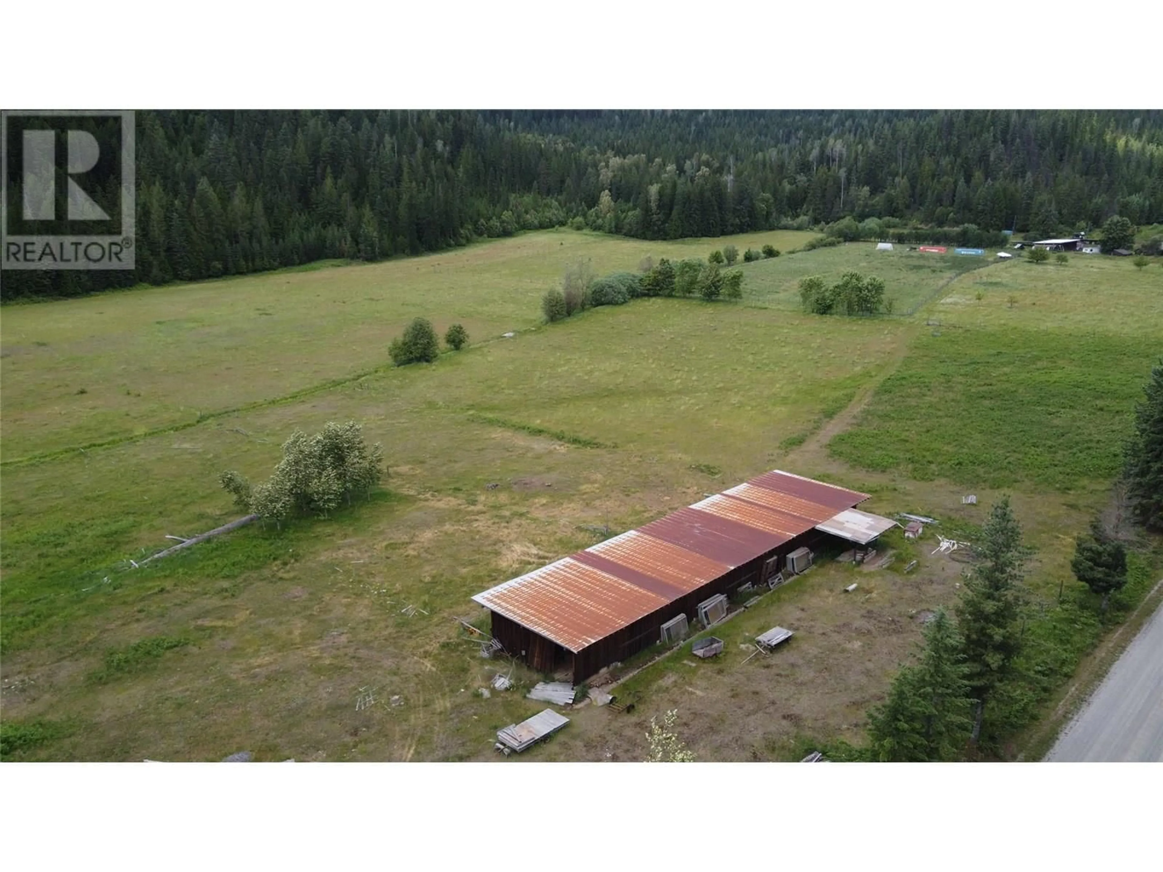 A pic from outside/outdoor area/front of a property/back of a property/a pic from drone, mountain view for 5795 KASLO SOUTH ROAD, Kaslo British Columbia V0G1M0