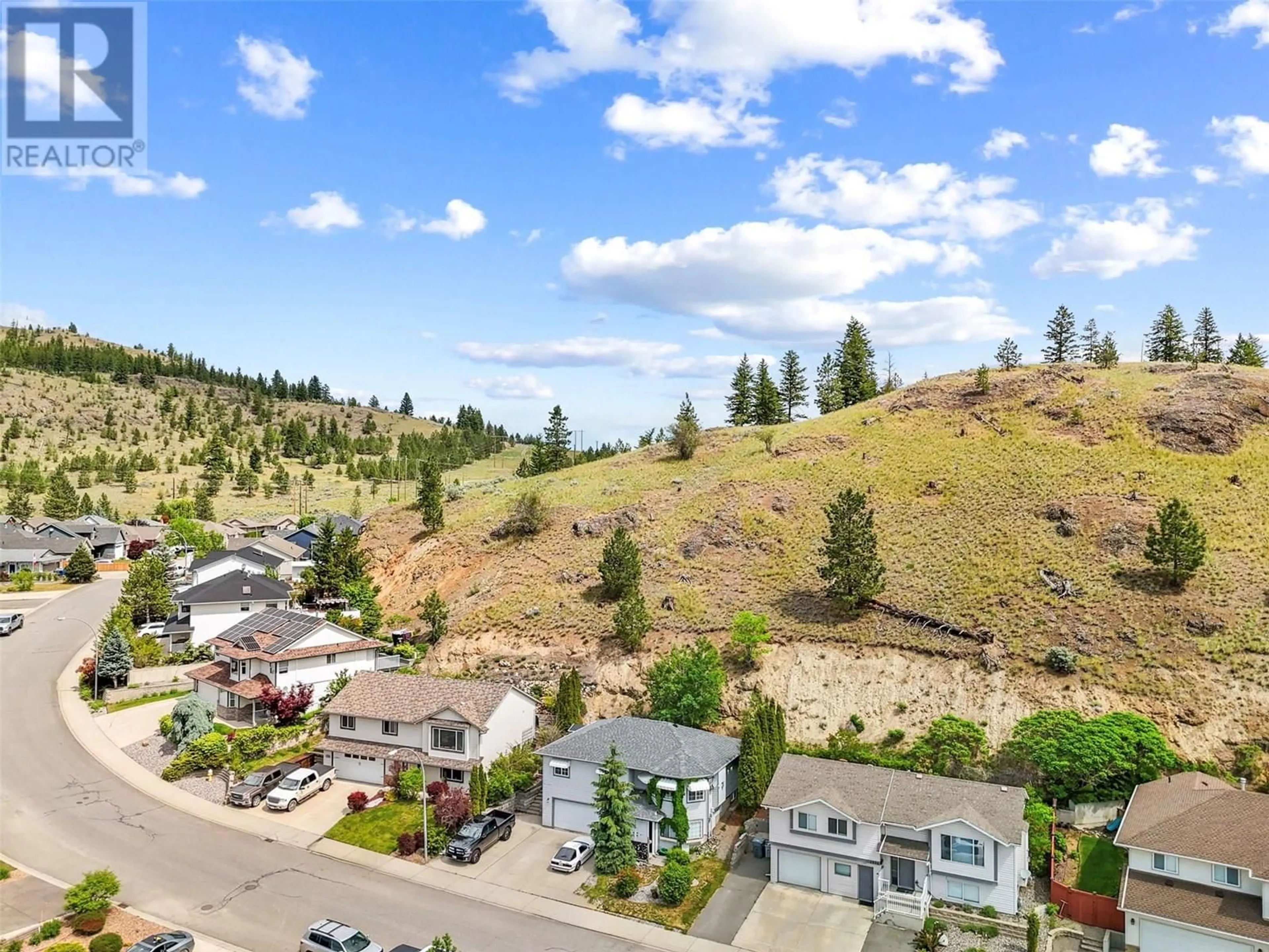 A pic from outside/outdoor area/front of a property/back of a property/a pic from drone, mountain view for 1368 SUNSHINE COURT, Kamloops British Columbia V2E2P9