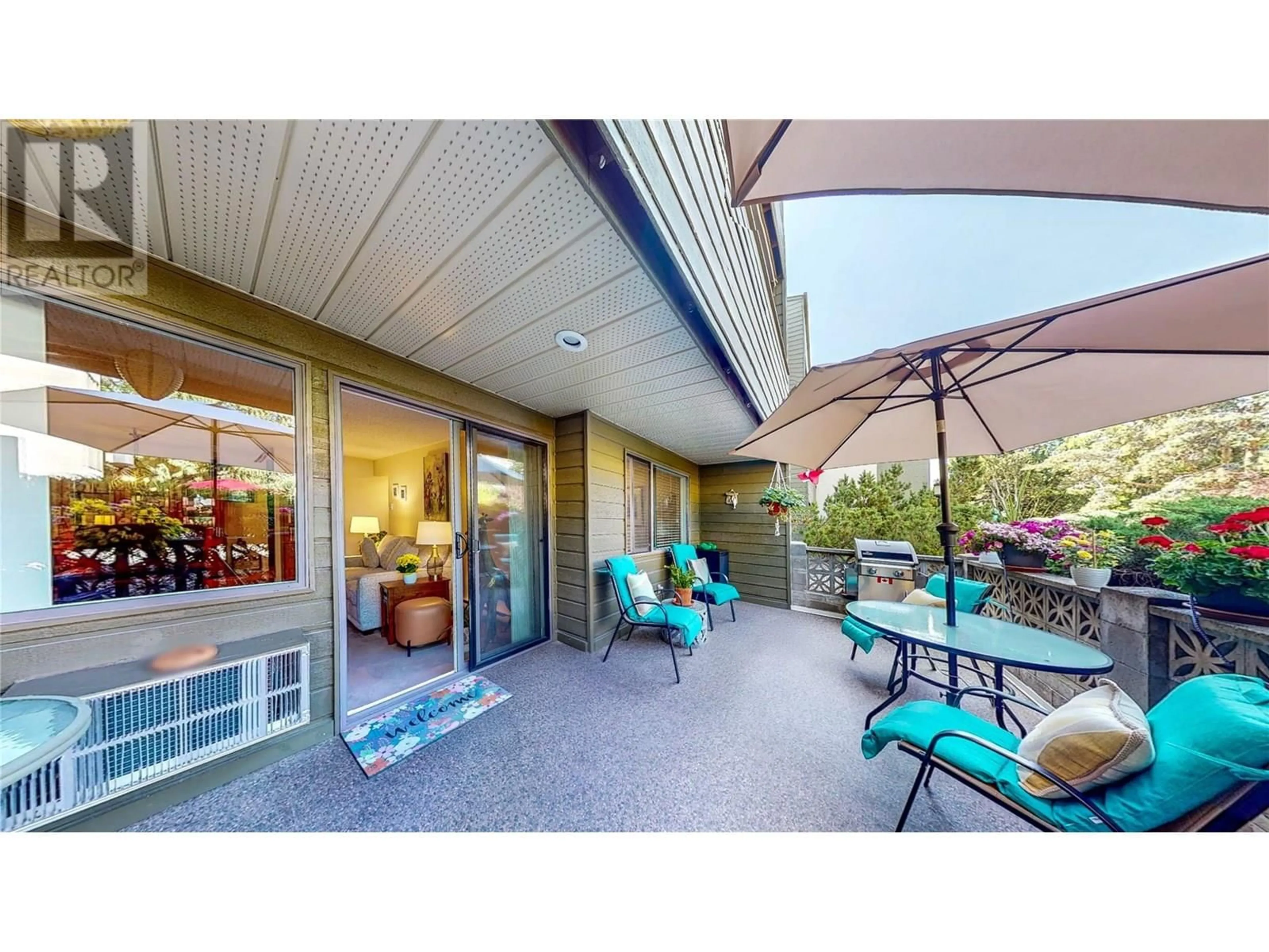 Patio, water/lake/river/ocean view for 112 - 1056 BERNARD AVENUE, Kelowna British Columbia V1Y8L7