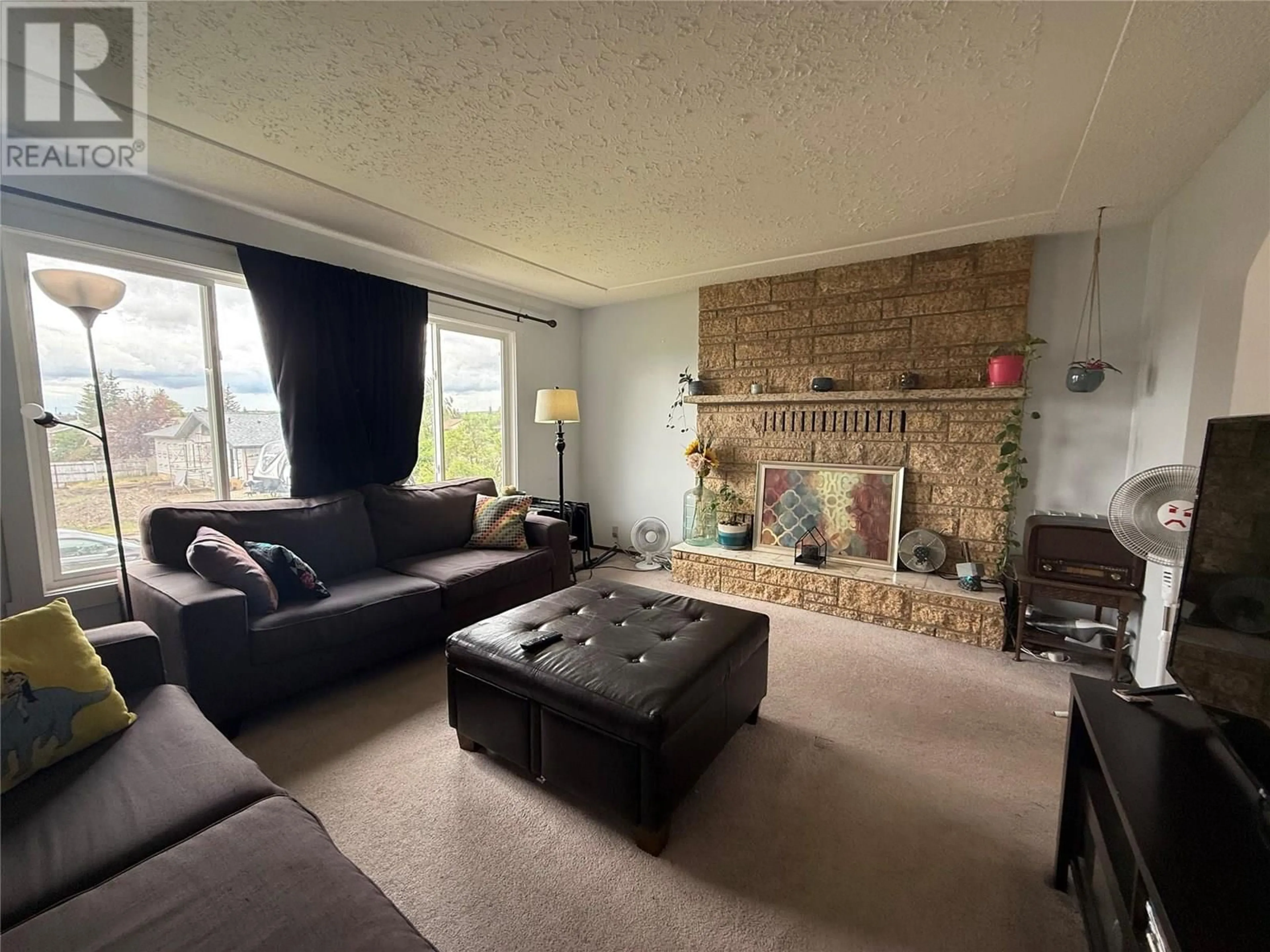 Living room with furniture, unknown for 9304 9 STREET, Dawson Creek British Columbia V1G3S3