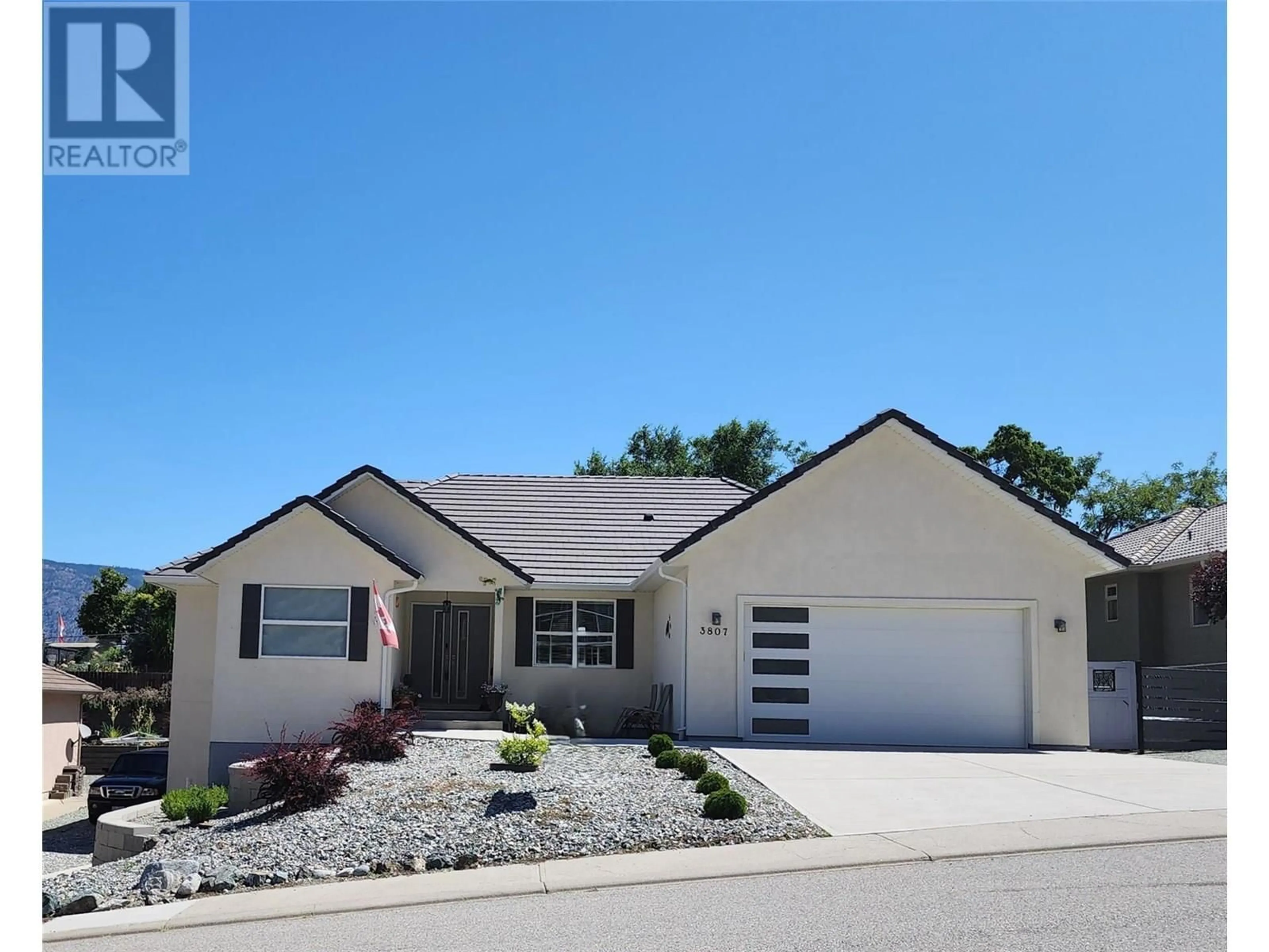 Home with vinyl exterior material, street for 3807 FAIRWINDS DRIVE, Osoyoos British Columbia V0H1V4