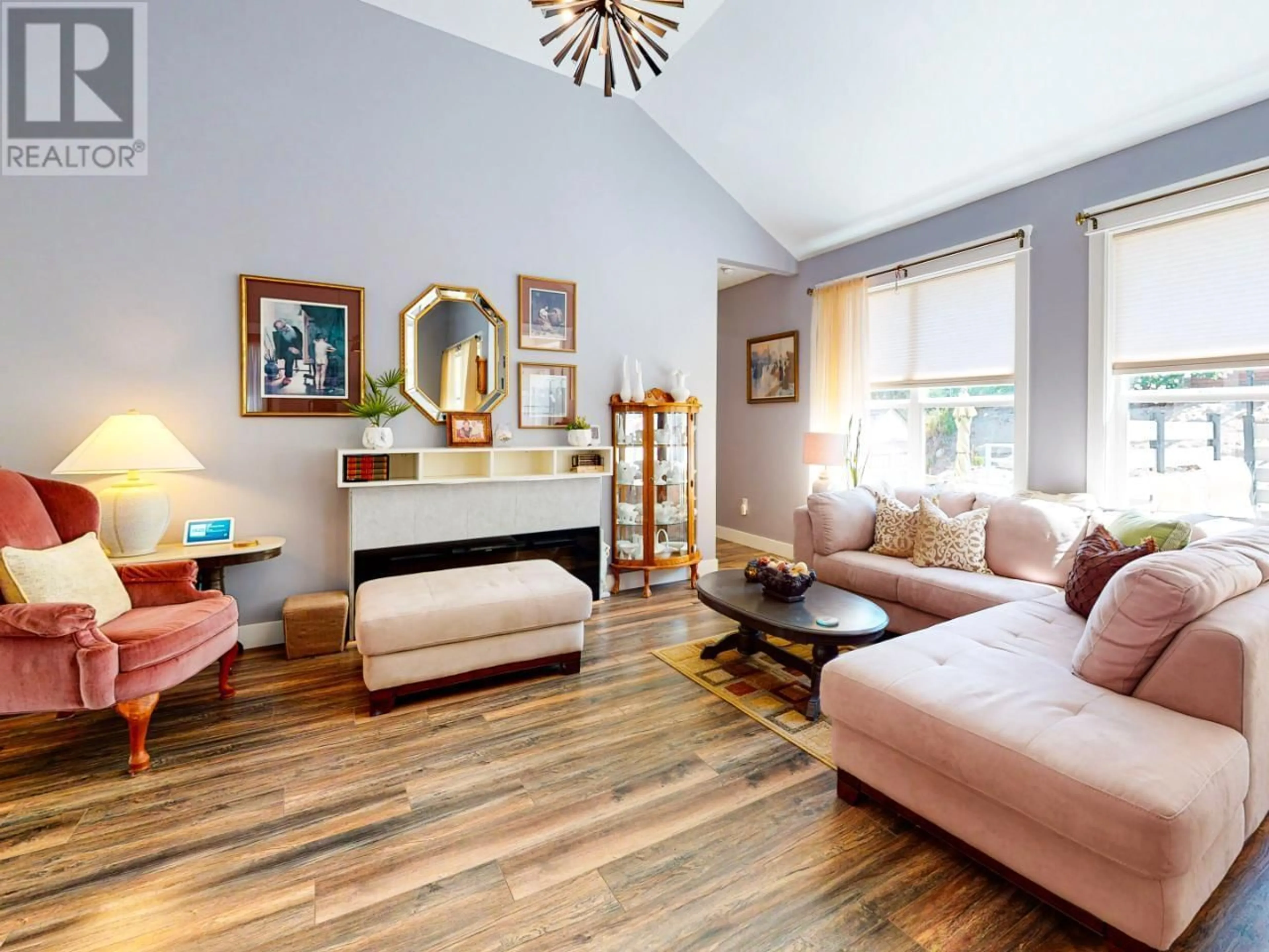 Living room with furniture, wood/laminate floor for 3807 FAIRWINDS DRIVE, Osoyoos British Columbia V0H1V4