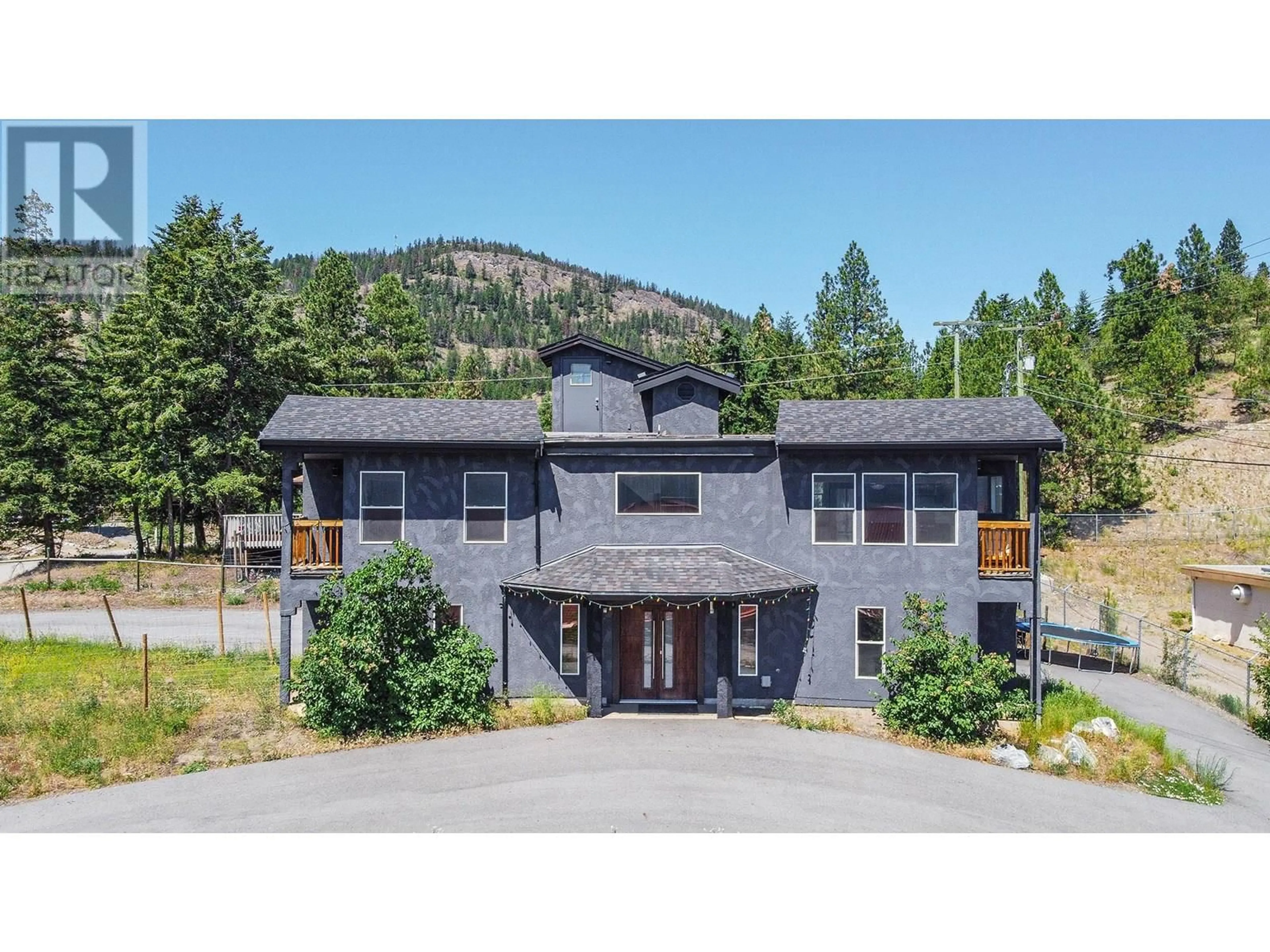 A pic from outside/outdoor area/front of a property/back of a property/a pic from drone, mountain view for 496 MOUNTAIN DRIVE, Vernon British Columbia V1H2B8
