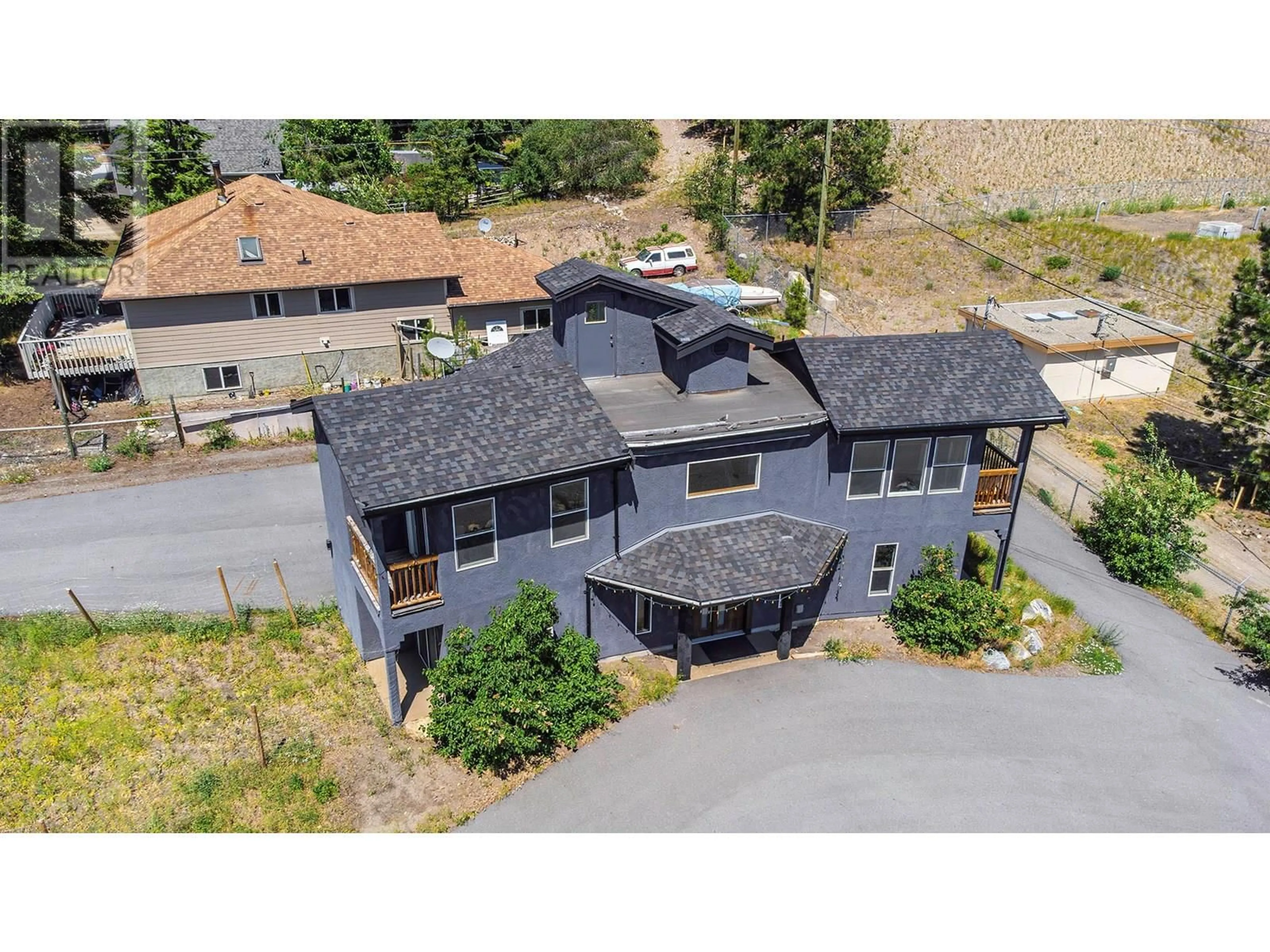 A pic from outside/outdoor area/front of a property/back of a property/a pic from drone, unknown for 496 MOUNTAIN DRIVE, Vernon British Columbia V1H2B8