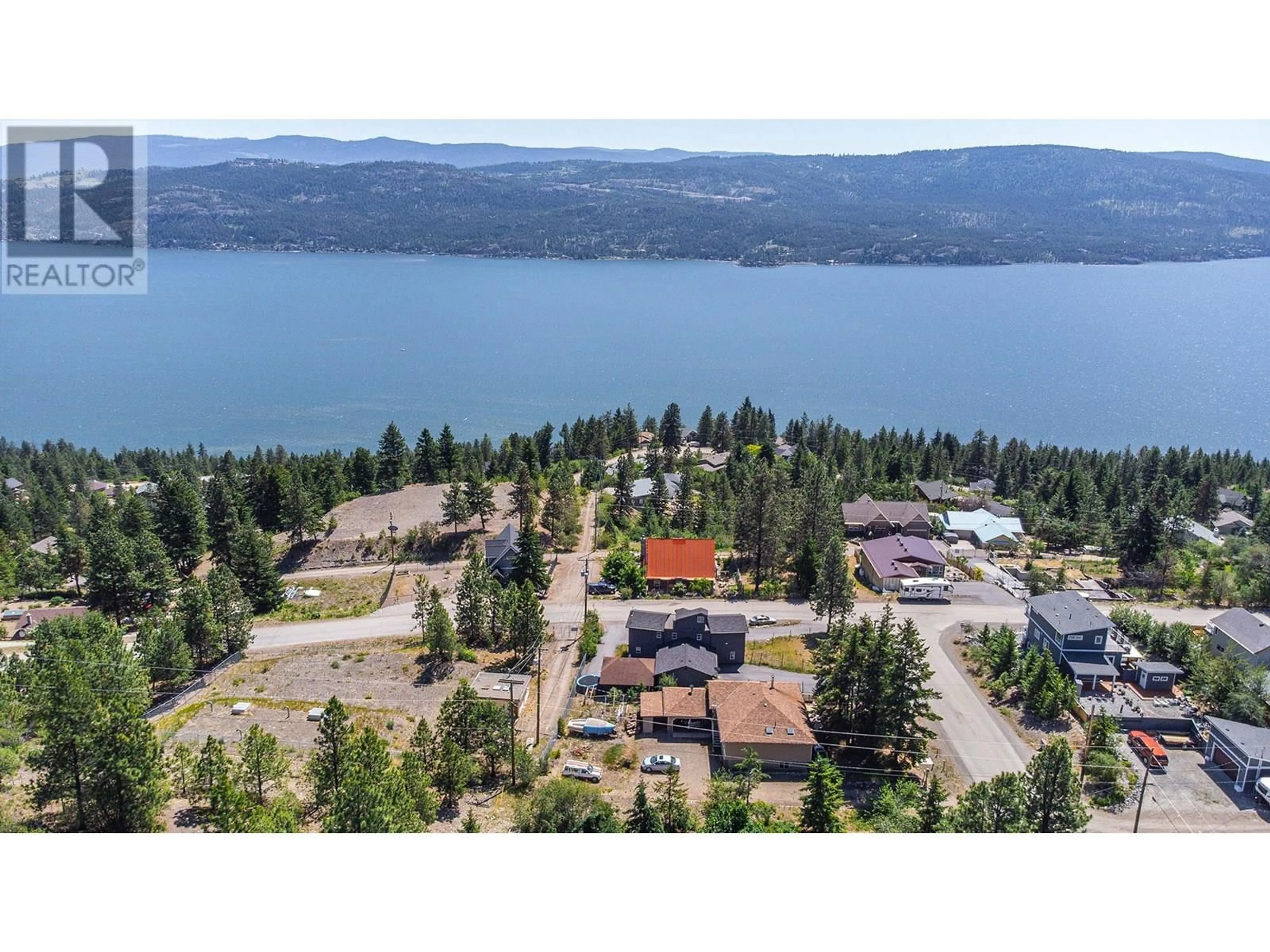 A pic from outside/outdoor area/front of a property/back of a property/a pic from drone, water/lake/river/ocean view for 496 MOUNTAIN DRIVE, Vernon British Columbia V1H2B8