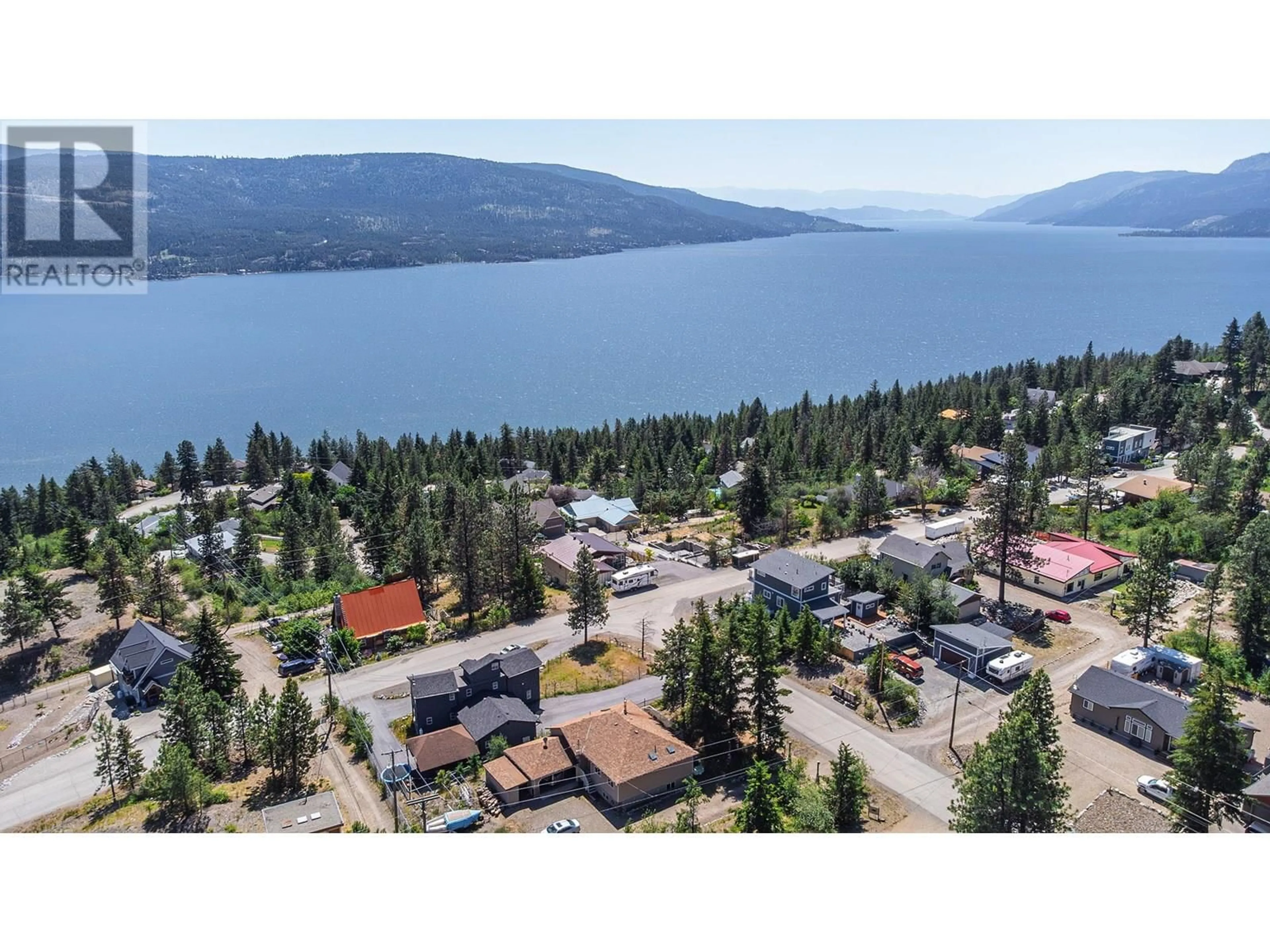 A pic from outside/outdoor area/front of a property/back of a property/a pic from drone, water/lake/river/ocean view for 496 MOUNTAIN DRIVE, Vernon British Columbia V1H2B8