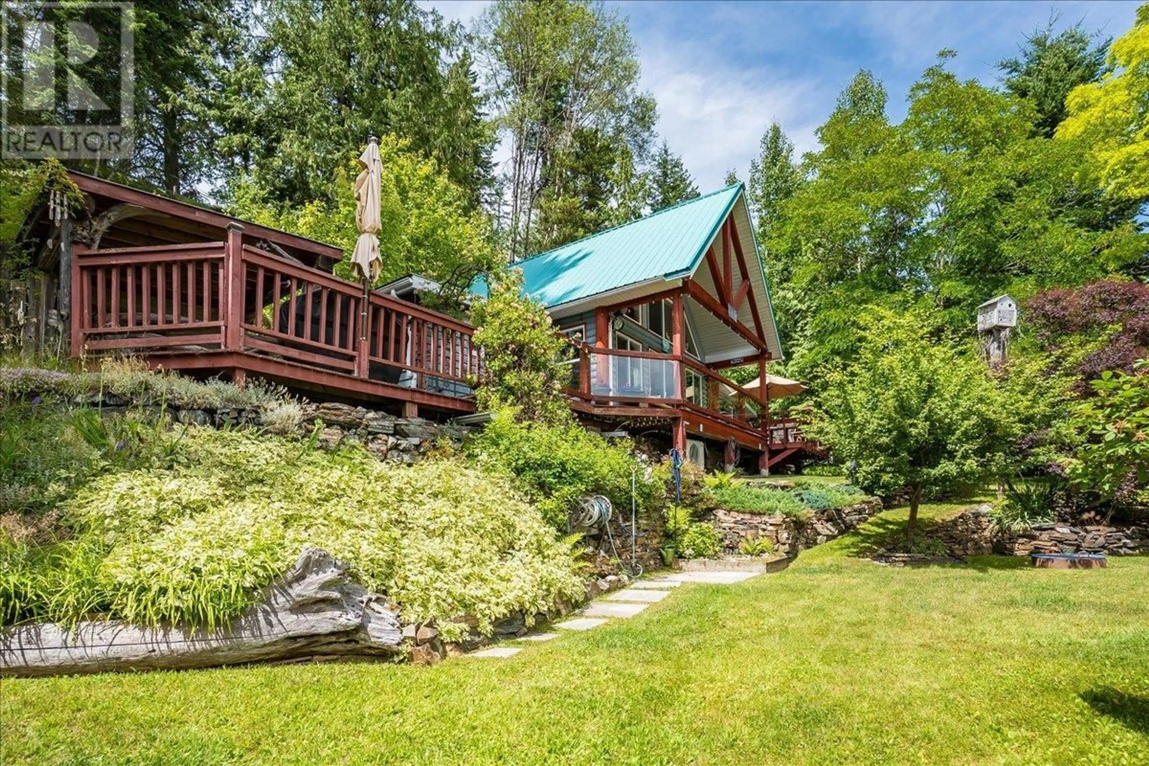 A pic from outside/outdoor area/front of a property/back of a property/a pic from drone, unknown for 5529 HIGHWAY 31 OTHER, Mirror Lake British Columbia V0G1M0