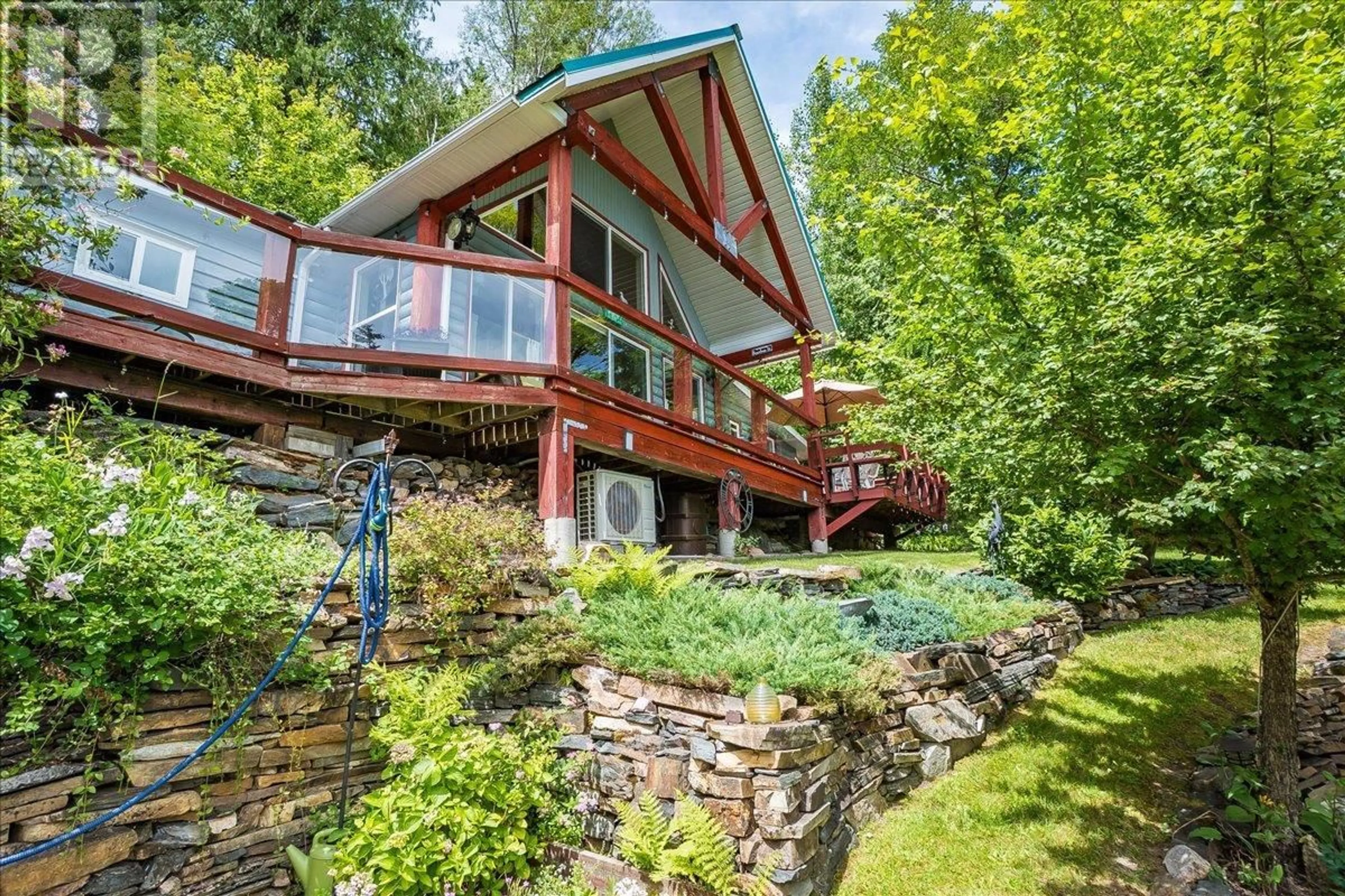 A pic from outside/outdoor area/front of a property/back of a property/a pic from drone, water/lake/river/ocean view for 5529 HIGHWAY 31 OTHER, Mirror Lake British Columbia V0G1M0