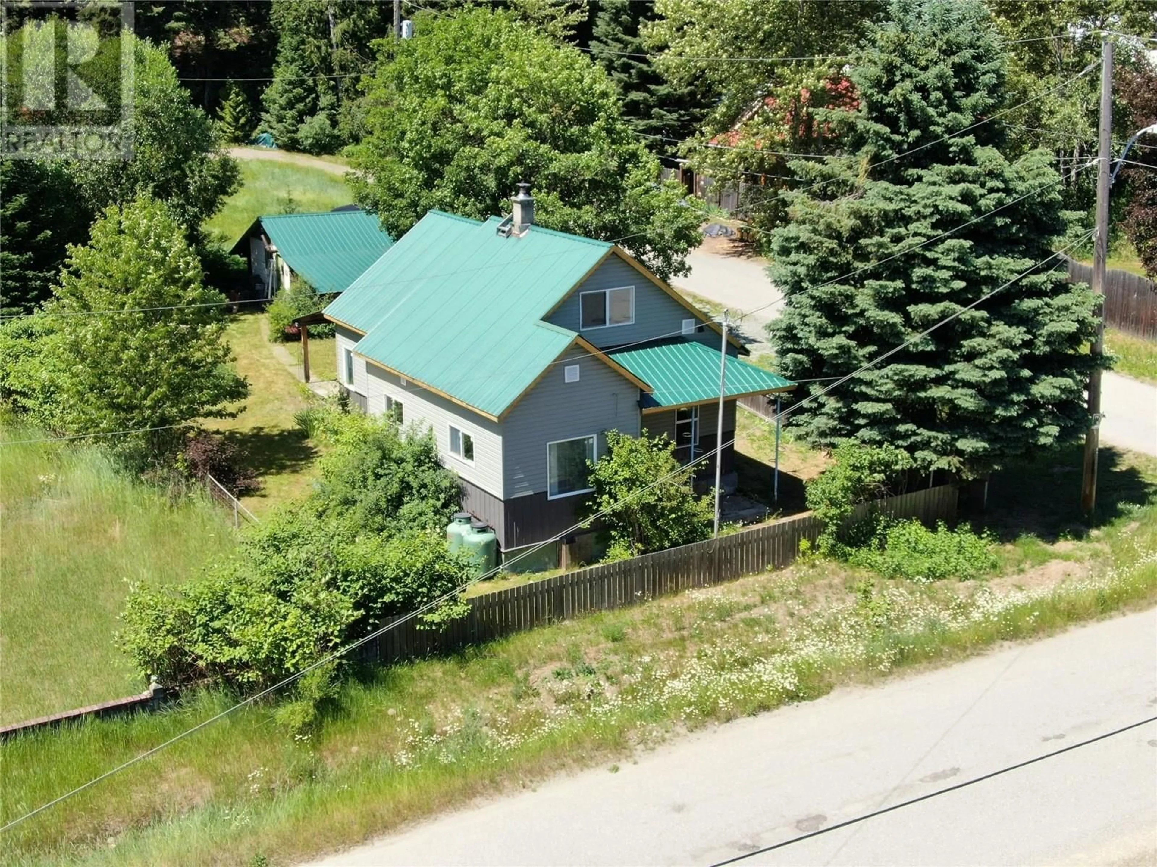 A pic from outside/outdoor area/front of a property/back of a property/a pic from drone, unknown for 303 FIR STREET, Ymir British Columbia V0G2K0