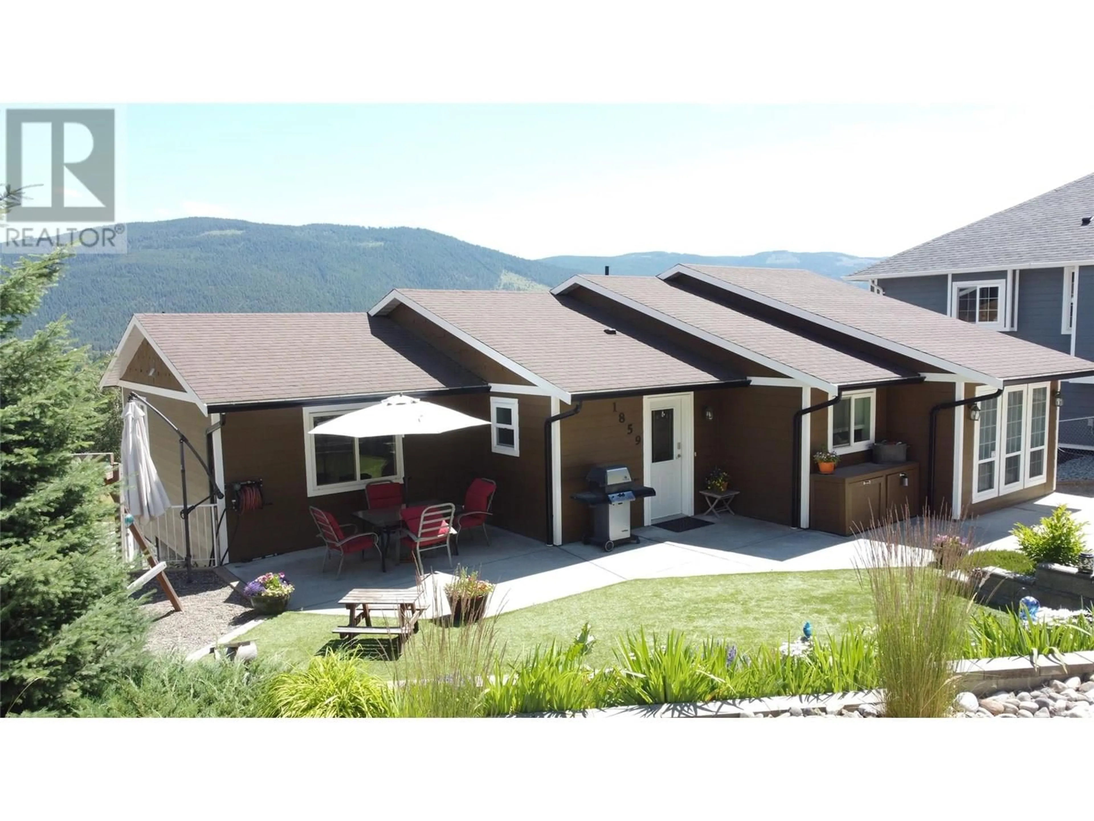 Home with vinyl exterior material, mountain view for 1859 SCHUNTER DRIVE, Lumby British Columbia V0E2G0