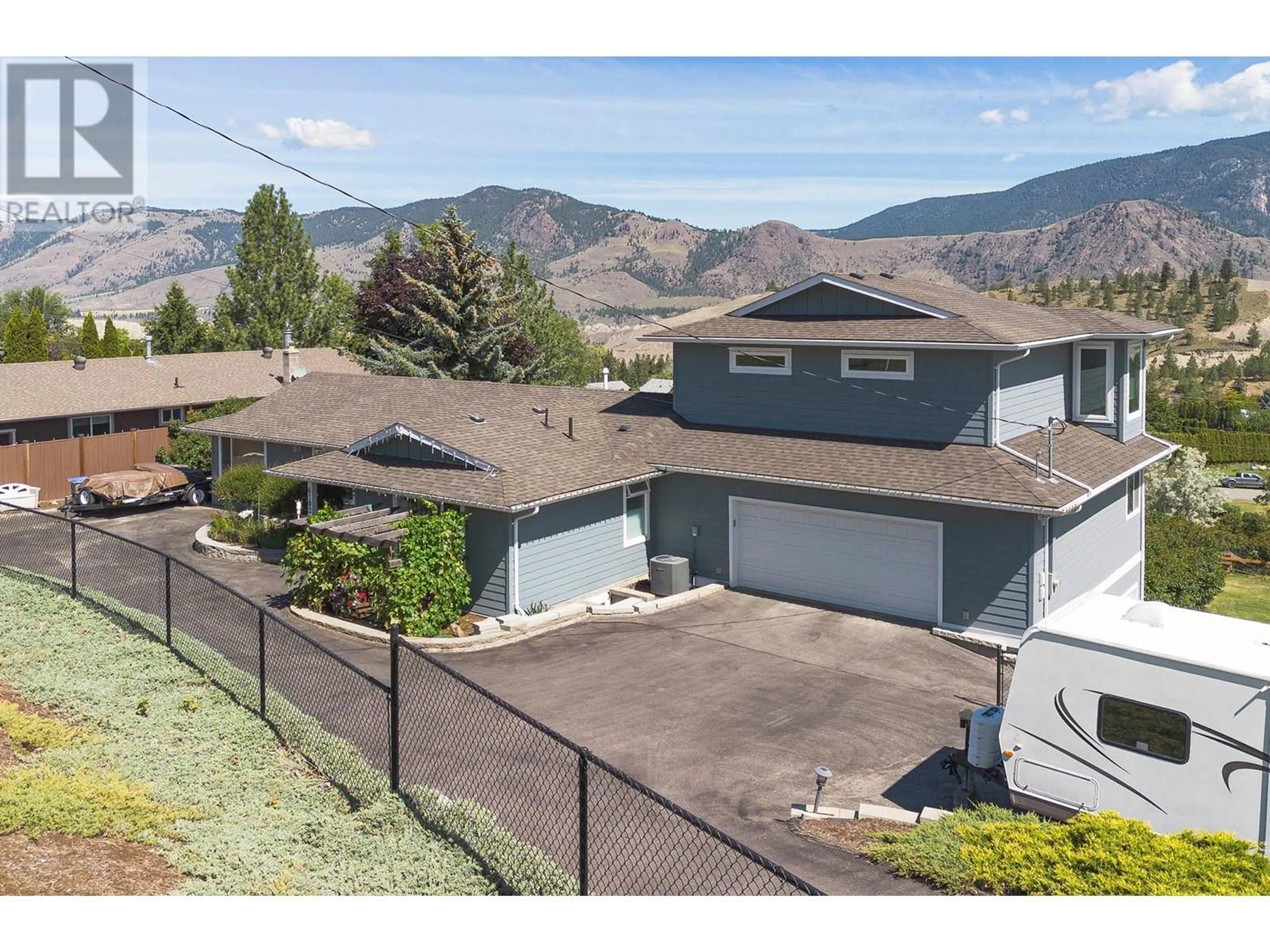 A pic from outside/outdoor area/front of a property/back of a property/a pic from drone, mountain view for 6102 MEADOWLAND CRESCENT SOUTH, Kamloops British Columbia V2C6X3