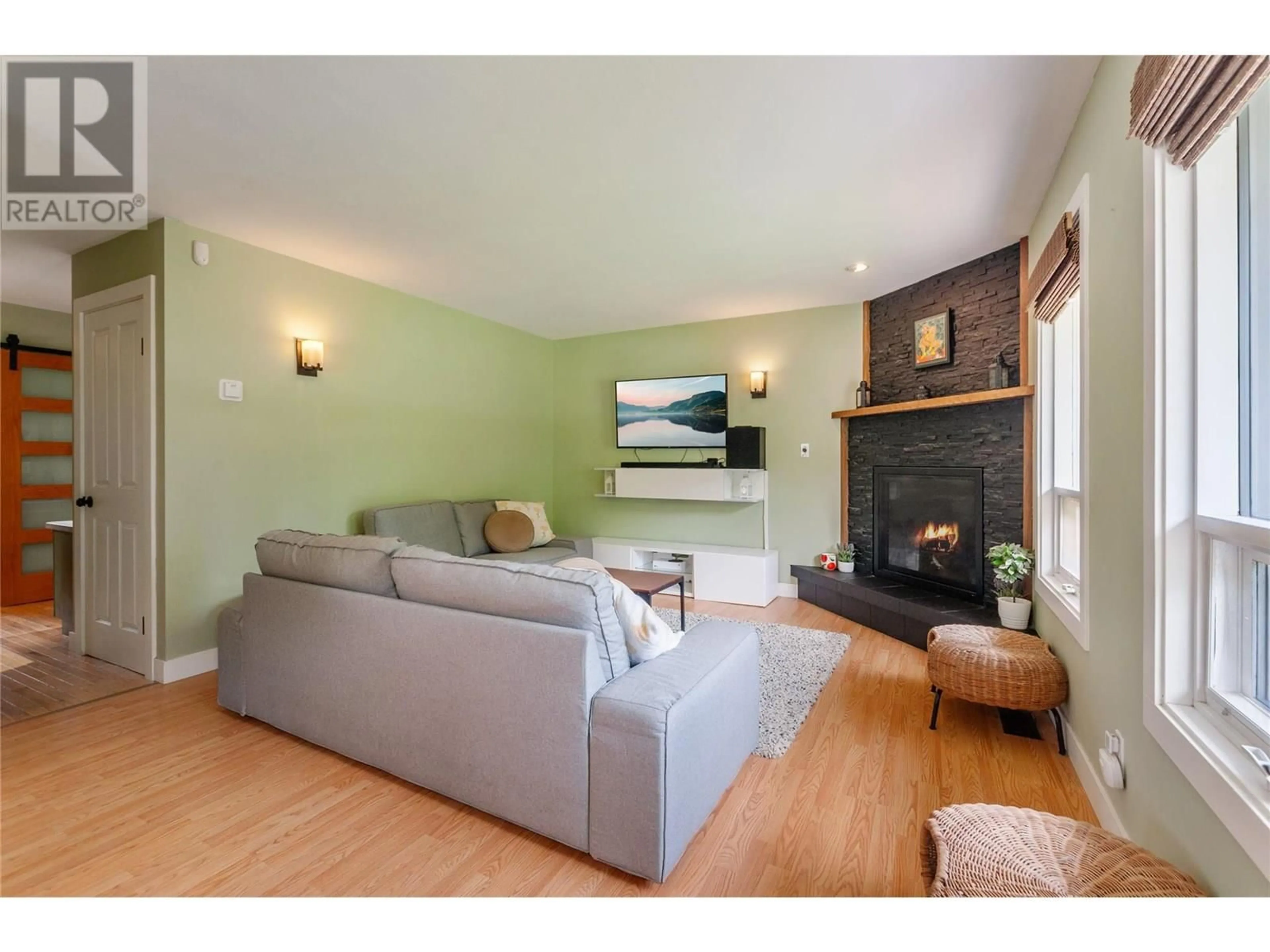 Living room with furniture, wood/laminate floor for 5036 14TH AVENUE, Okanagan Falls British Columbia V0H1R0