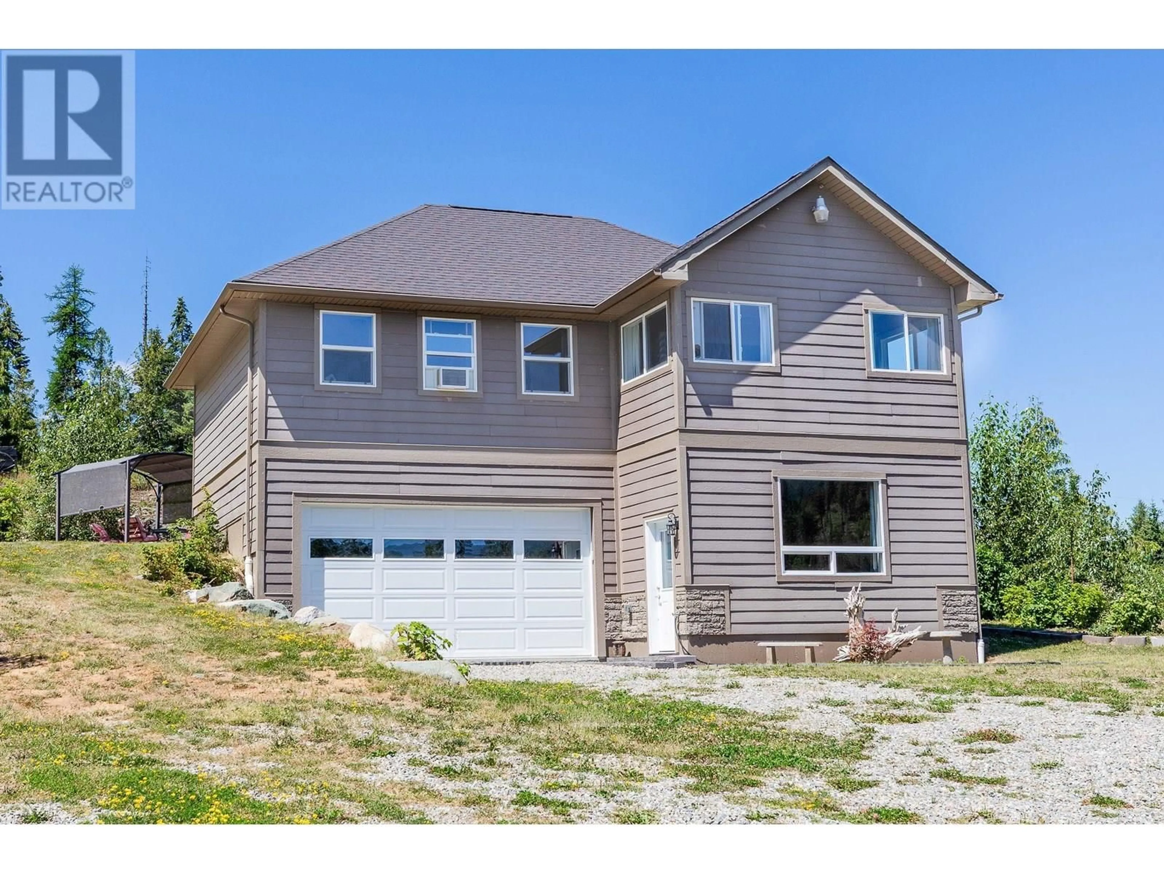 Home with vinyl exterior material, street for 615 LAKEVIEW ARROWCREEK ROAD, Creston British Columbia V0B1G8