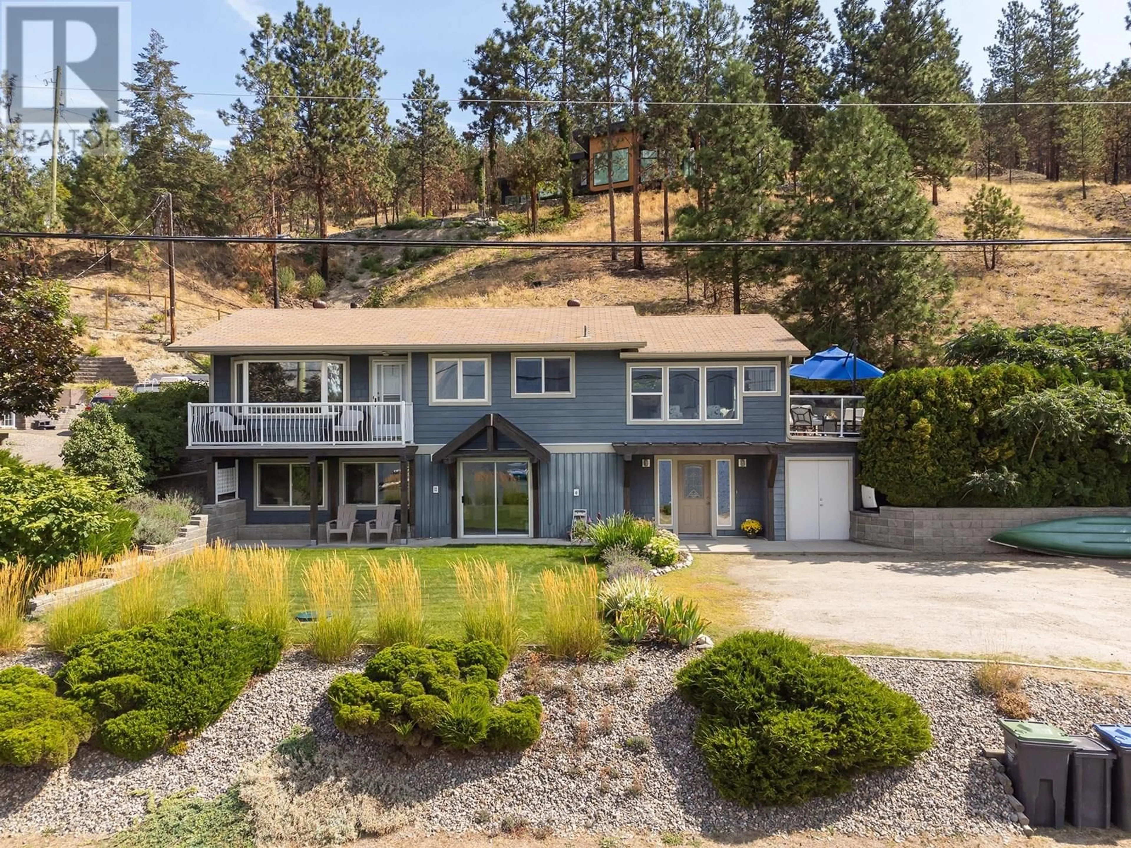 A pic from outside/outdoor area/front of a property/back of a property/a pic from drone, unknown for 10837 OKANAGAN CENTRE ROAD WEST, Lake Country British Columbia V4V2H8