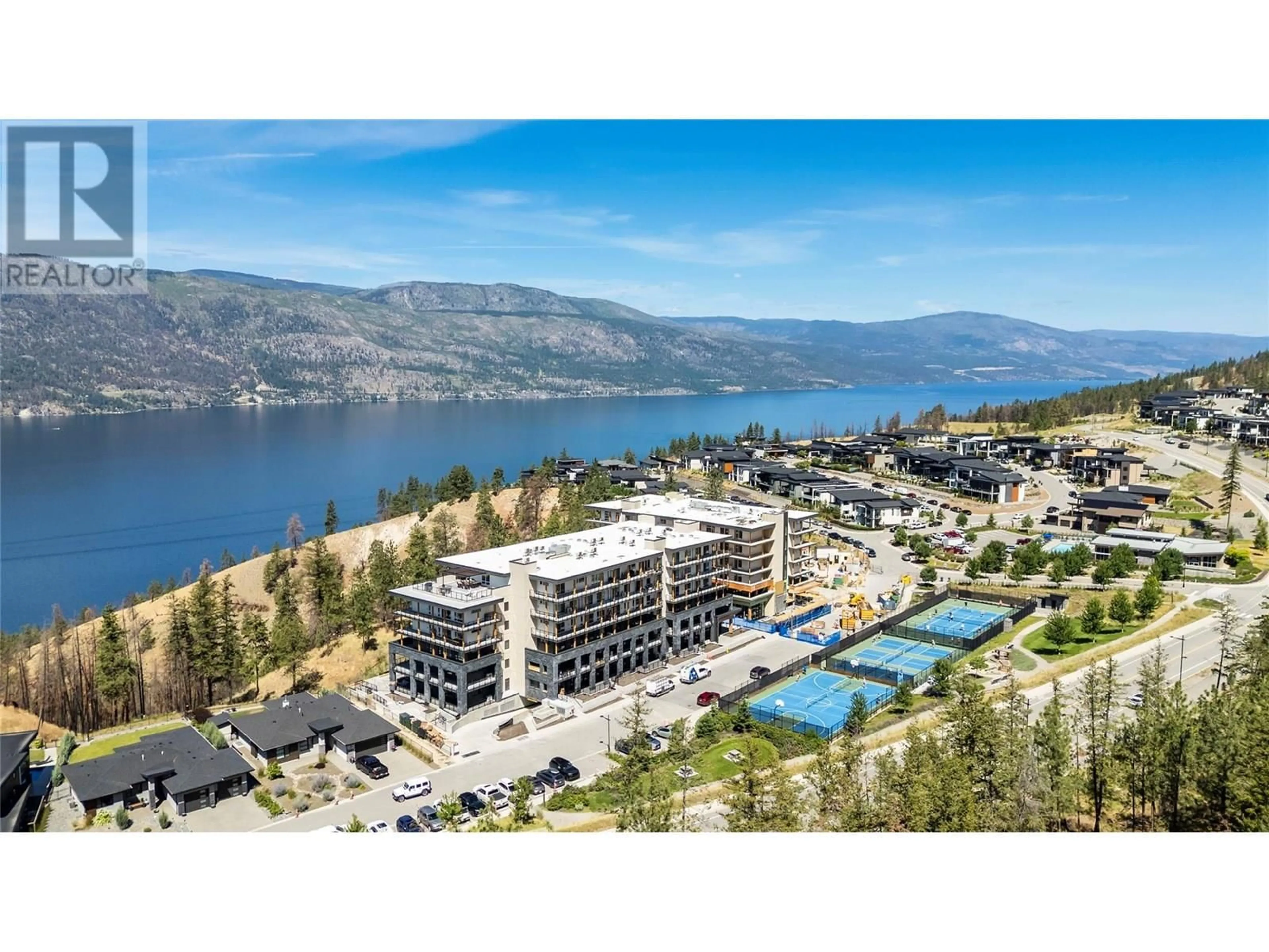 A pic from outside/outdoor area/front of a property/back of a property/a pic from drone, mountain view for 501 - 9652 BENCHLAND DRIVE, Lake Country British Columbia V4V1N3
