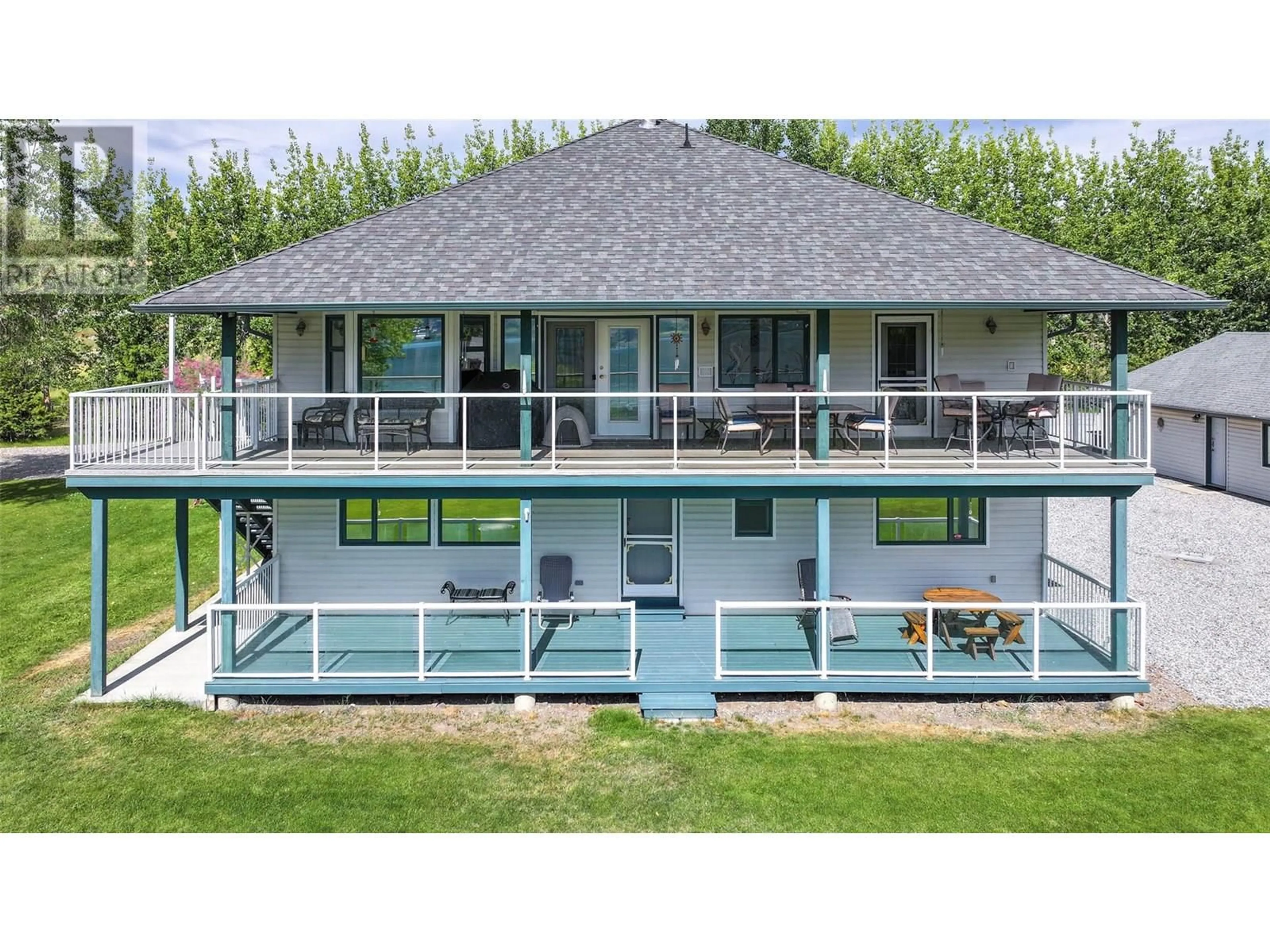 A pic from outside/outdoor area/front of a property/back of a property/a pic from drone, water/lake/river/ocean view for 7821 OLD KAMLOOPS ROAD, Vernon British Columbia V1H1W8