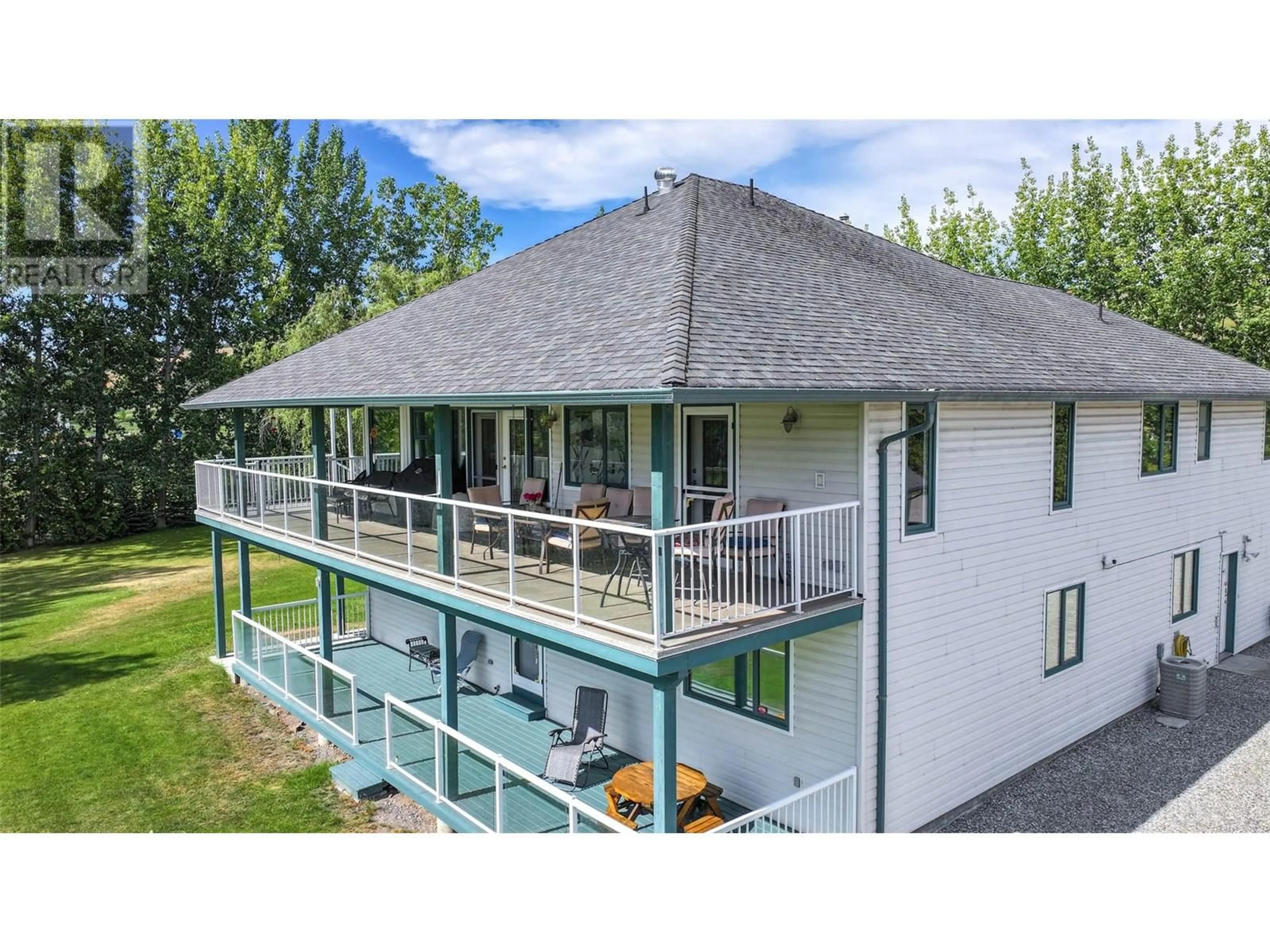 A pic from outside/outdoor area/front of a property/back of a property/a pic from drone, building for 7821 OLD KAMLOOPS ROAD, Vernon British Columbia V1H1W8
