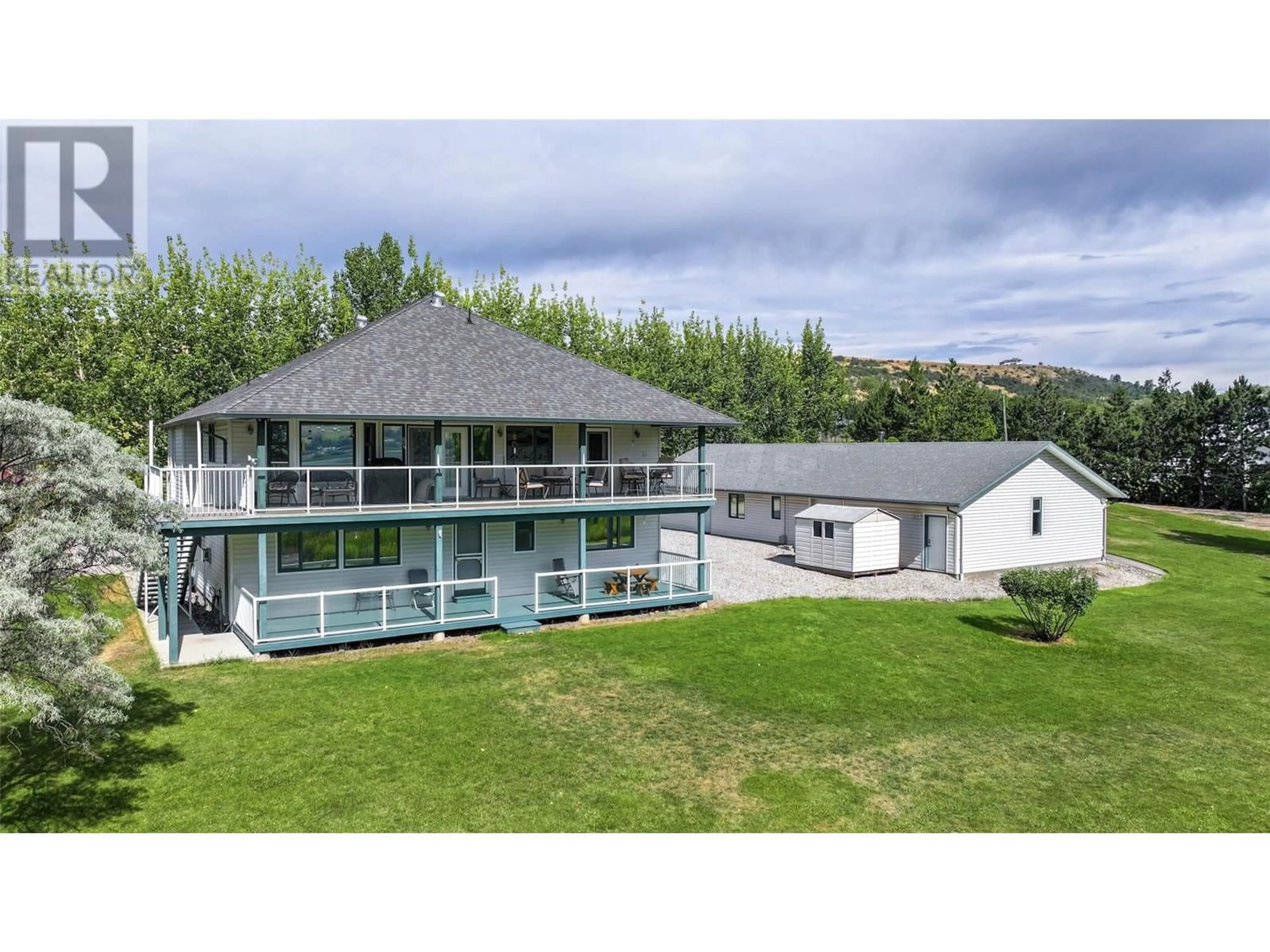 A pic from outside/outdoor area/front of a property/back of a property/a pic from drone, mountain view for 7821 OLD KAMLOOPS ROAD, Vernon British Columbia V1H1W8