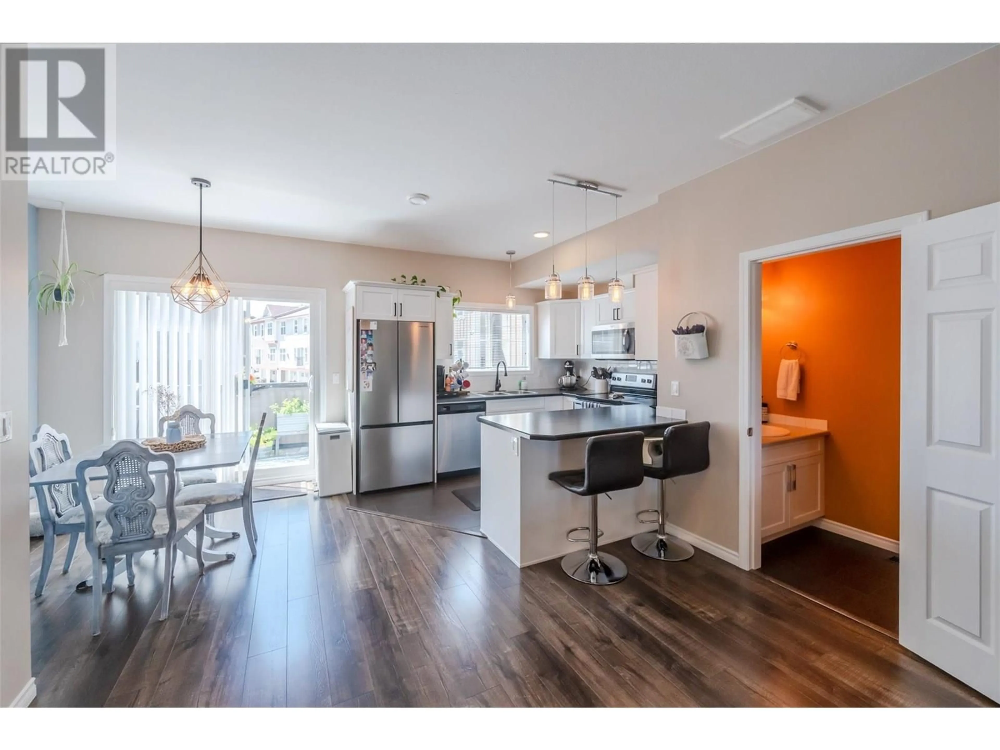 Open concept kitchen, wood/laminate floor for 112 - 3363 WILSON STREET, Penticton British Columbia V2A9G7
