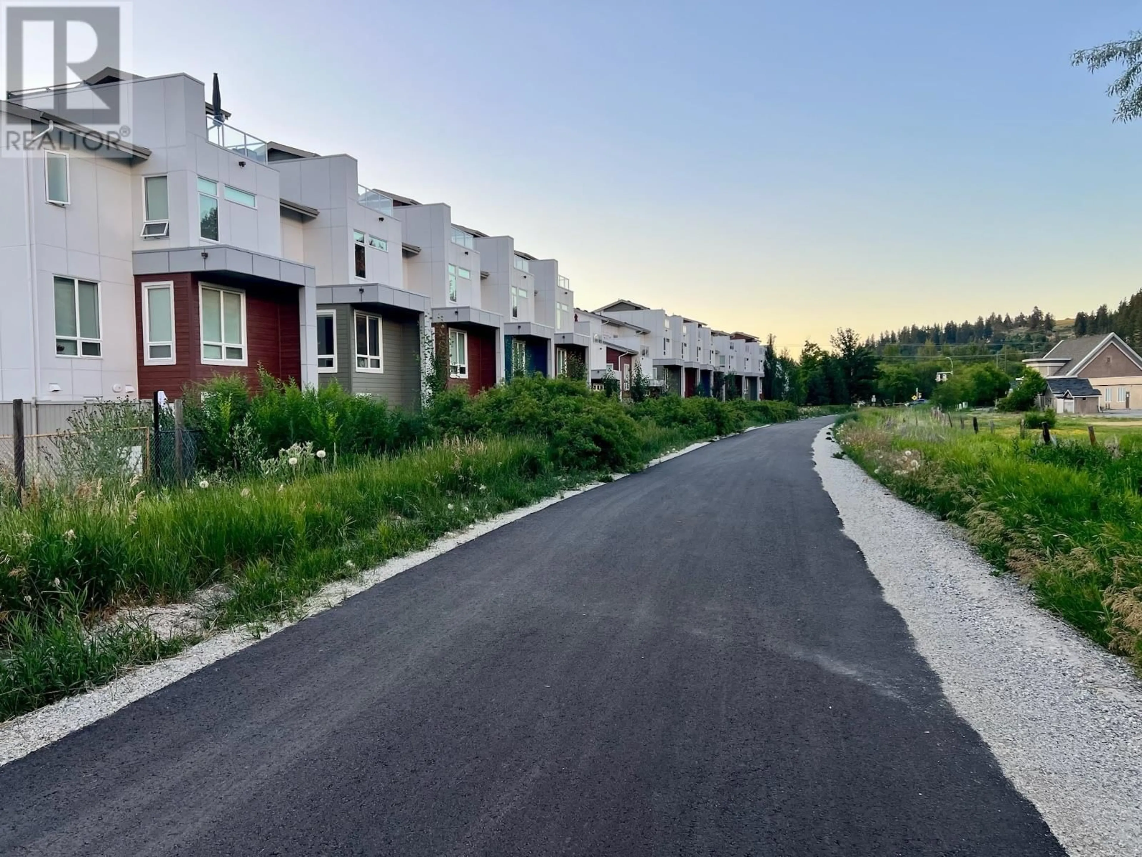 A pic from outside/outdoor area/front of a property/back of a property/a pic from drone, street for 21 - 3719 WOODSDALE OTHER, Lake Country British Columbia V4V1X2