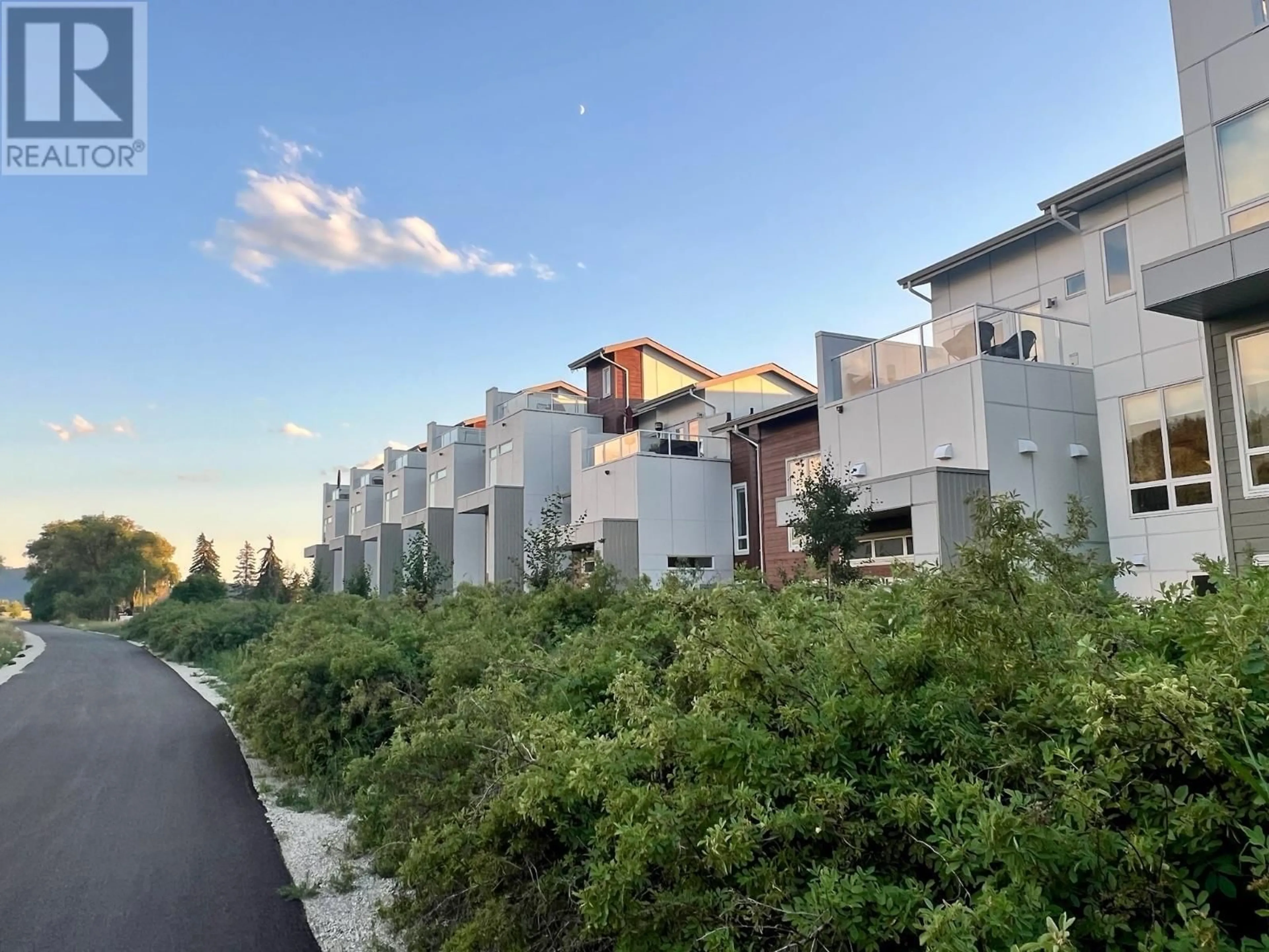 A pic from outside/outdoor area/front of a property/back of a property/a pic from drone, street for 21 - 3719 WOODSDALE OTHER, Lake Country British Columbia V4V1X2