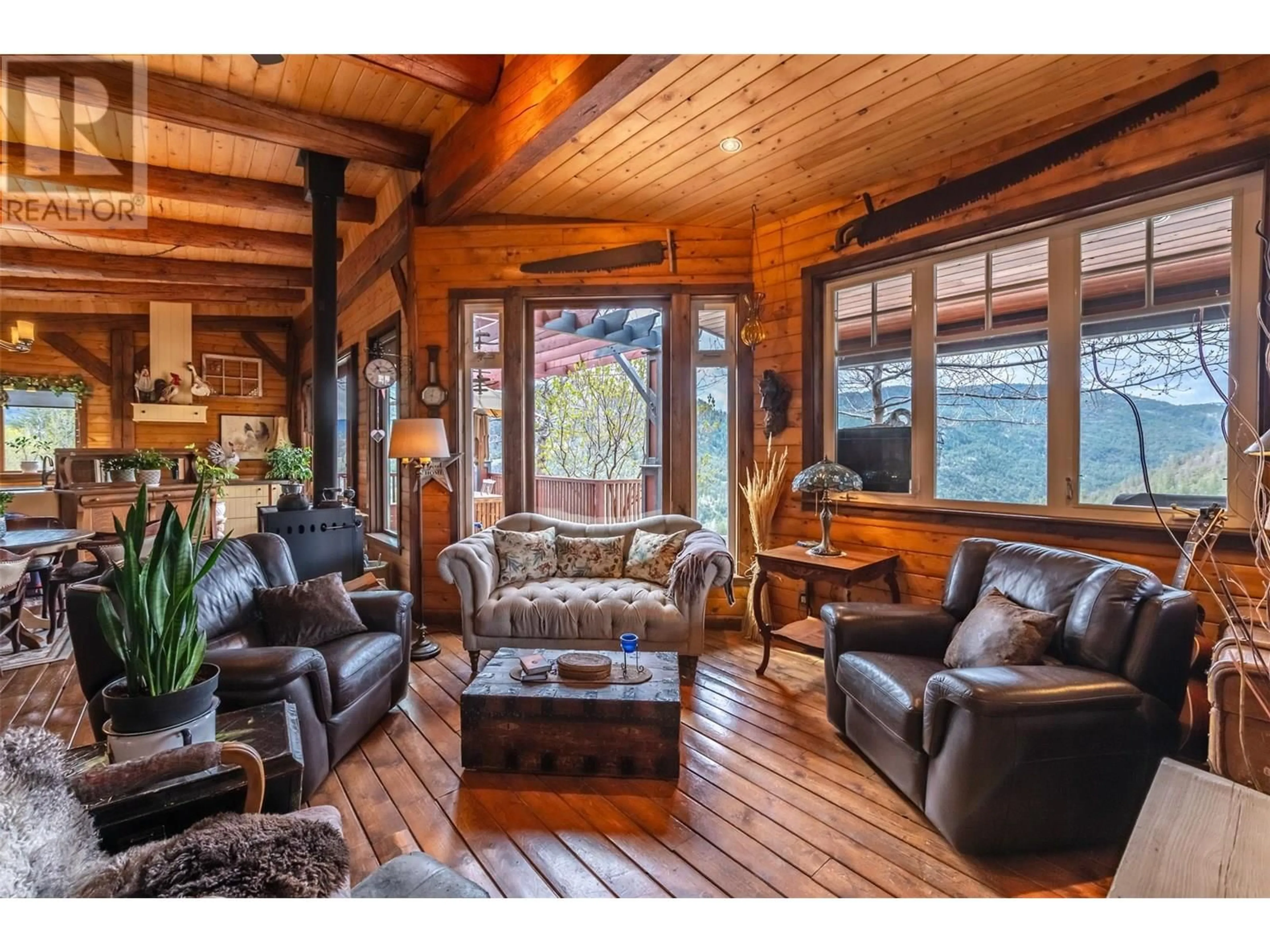 Living room with furniture, wood/laminate floor for 795 SHEEP CREEK ROAD, Kaleden British Columbia V0K1K0