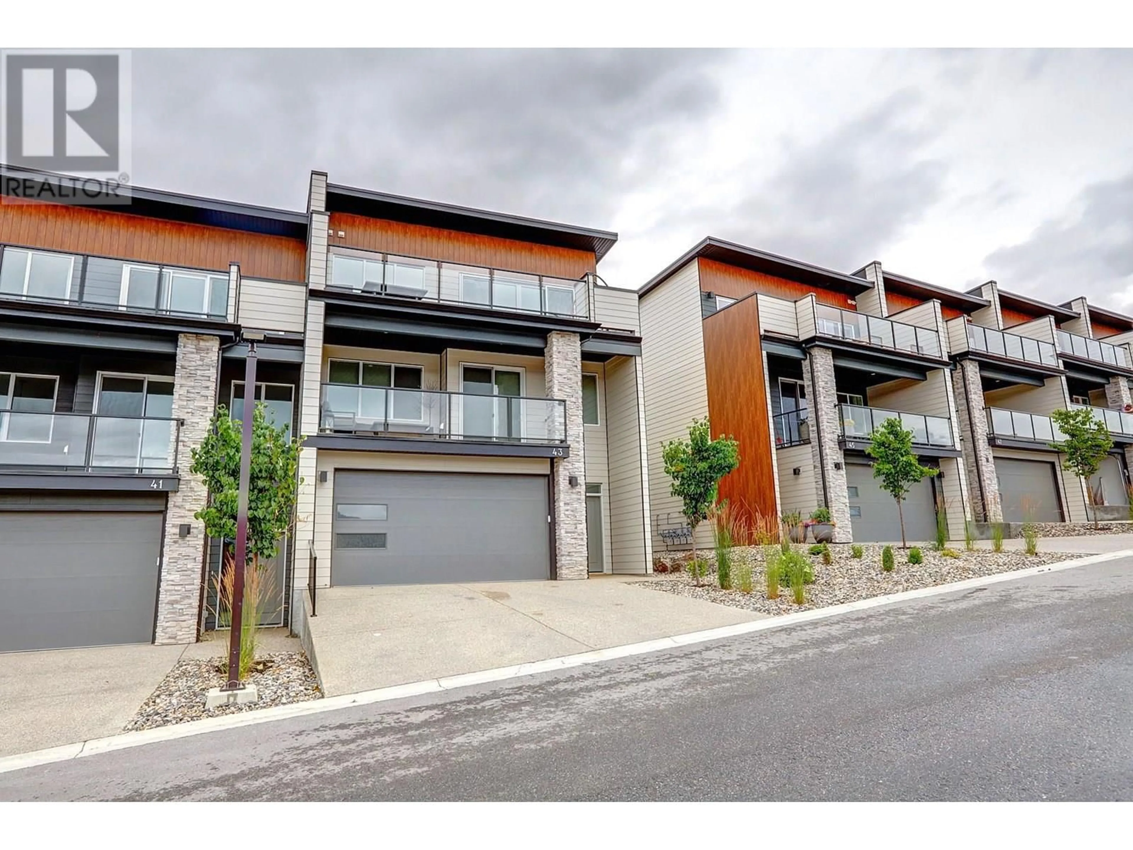 A pic from outside/outdoor area/front of a property/back of a property/a pic from drone, street for 43 - 7735 OKANAGAN HILLS BOULEVARD, Vernon British Columbia V1H0A7