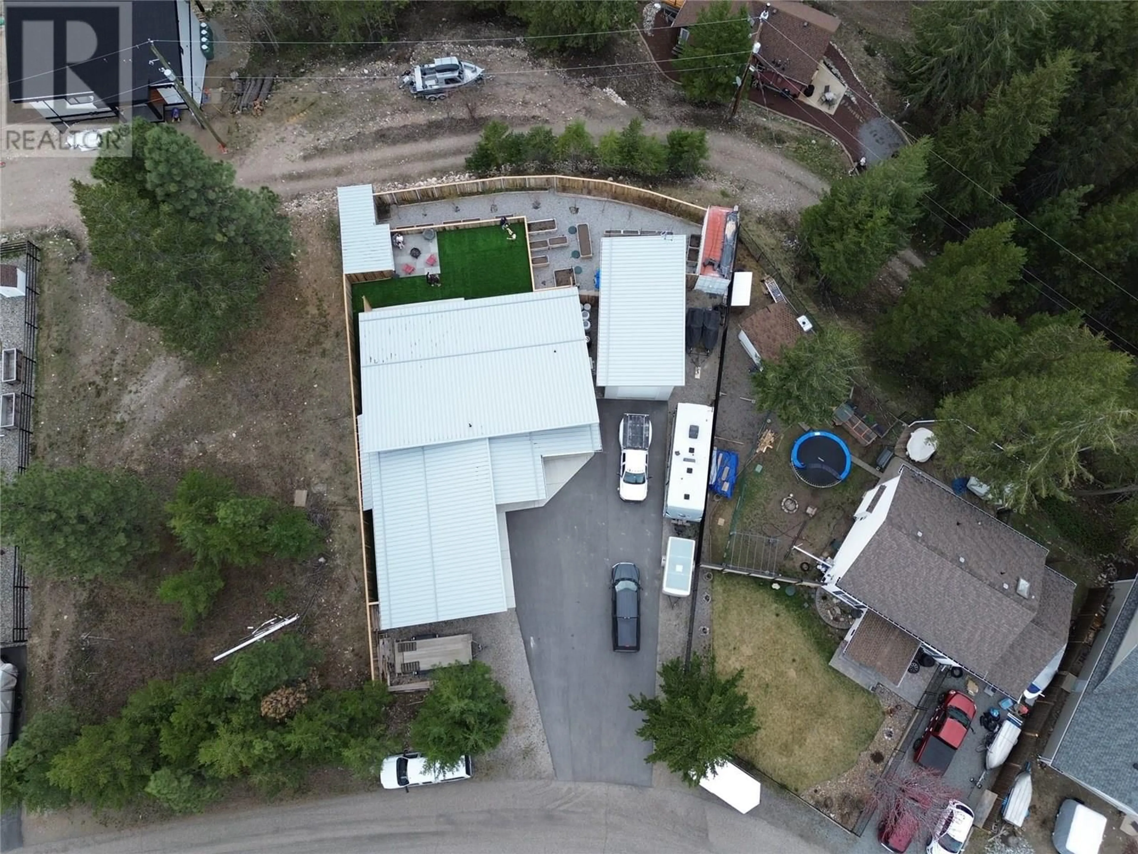 A pic from outside/outdoor area/front of a property/back of a property/a pic from drone, unknown for 174 CROWN CRESCENT, Vernon British Columbia V1H2C3