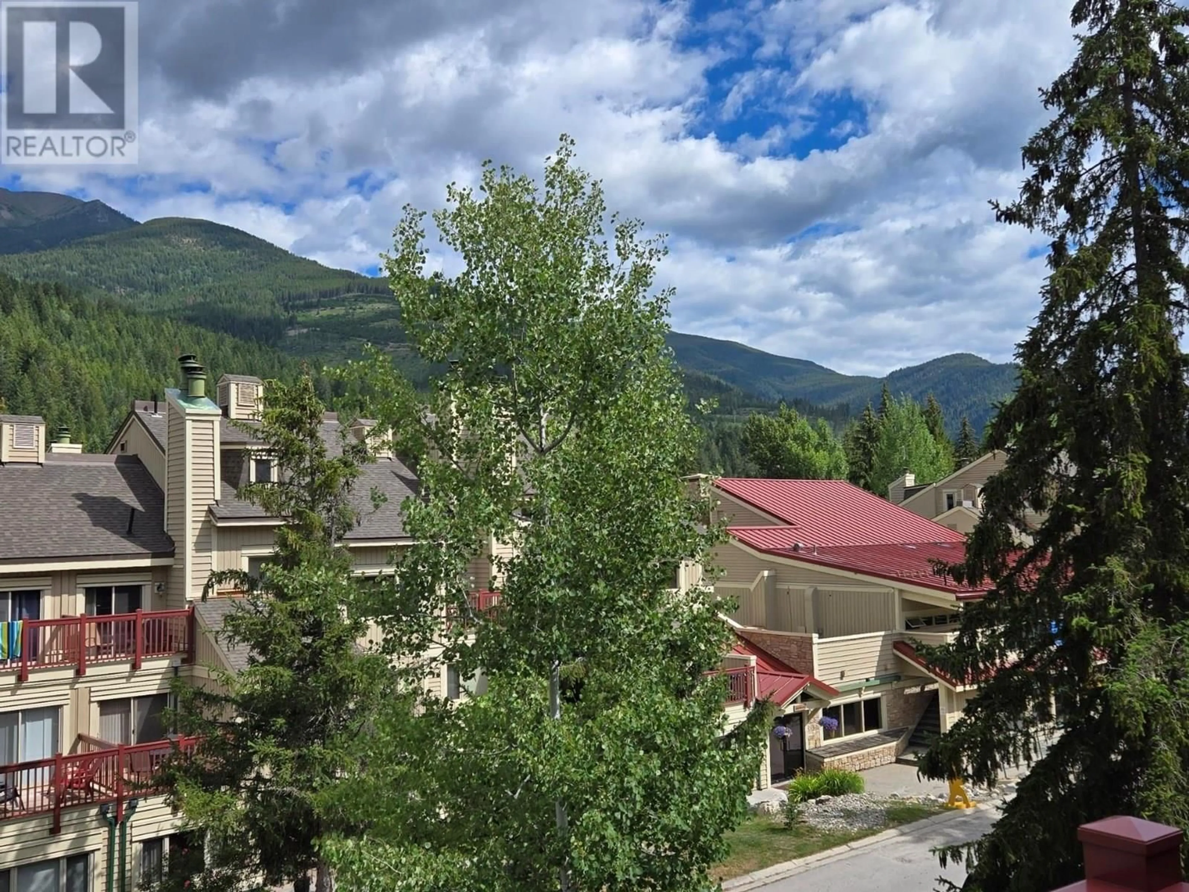 A pic from outside/outdoor area/front of a property/back of a property/a pic from drone, mountain view for 526 - 2030 PANORAMA DRIVE, Panorama British Columbia V0A1T0