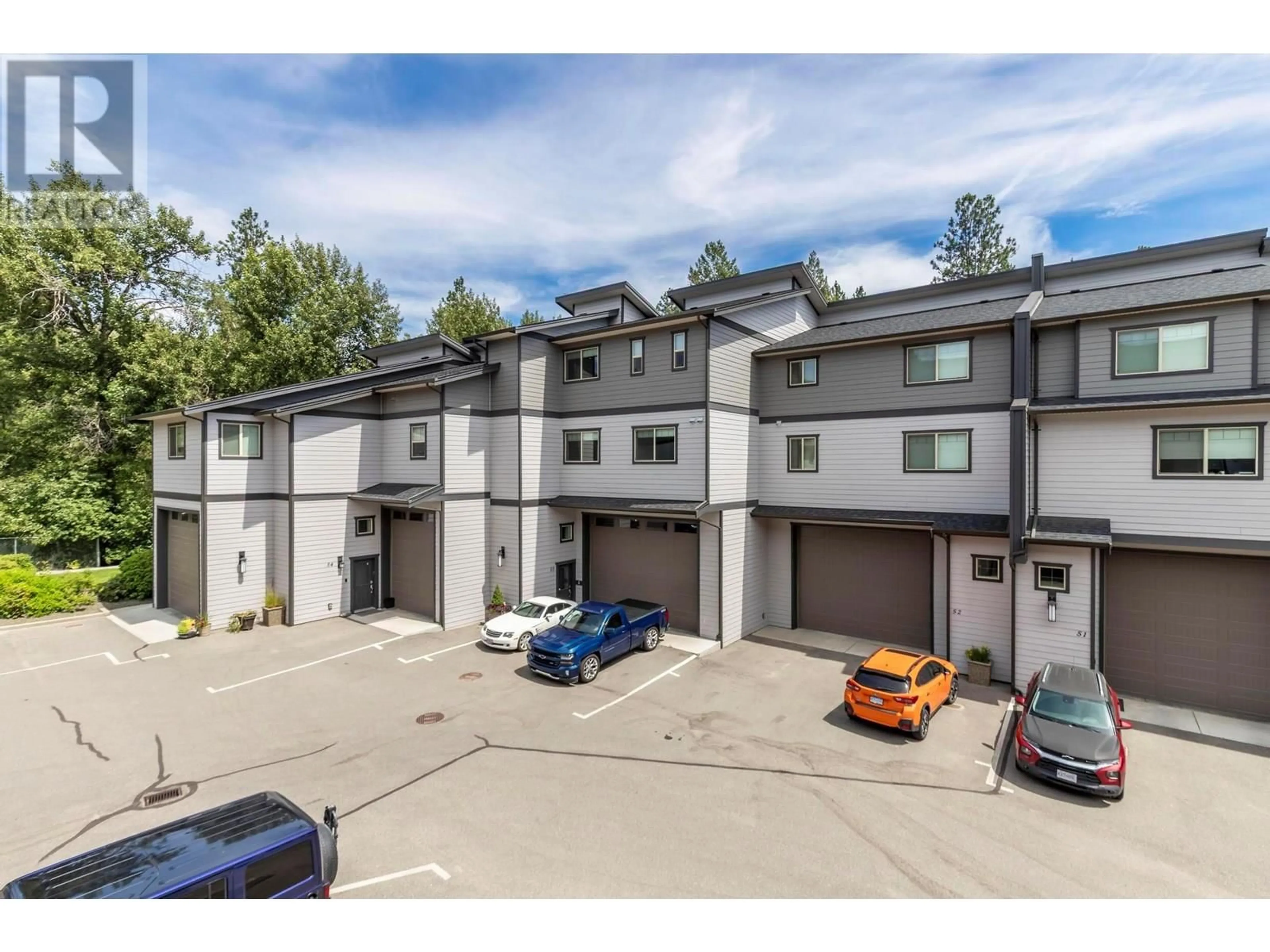 A pic from outside/outdoor area/front of a property/back of a property/a pic from drone, street for 45 - 3359 COUGAR ROAD, Westbank British Columbia V4T3G1