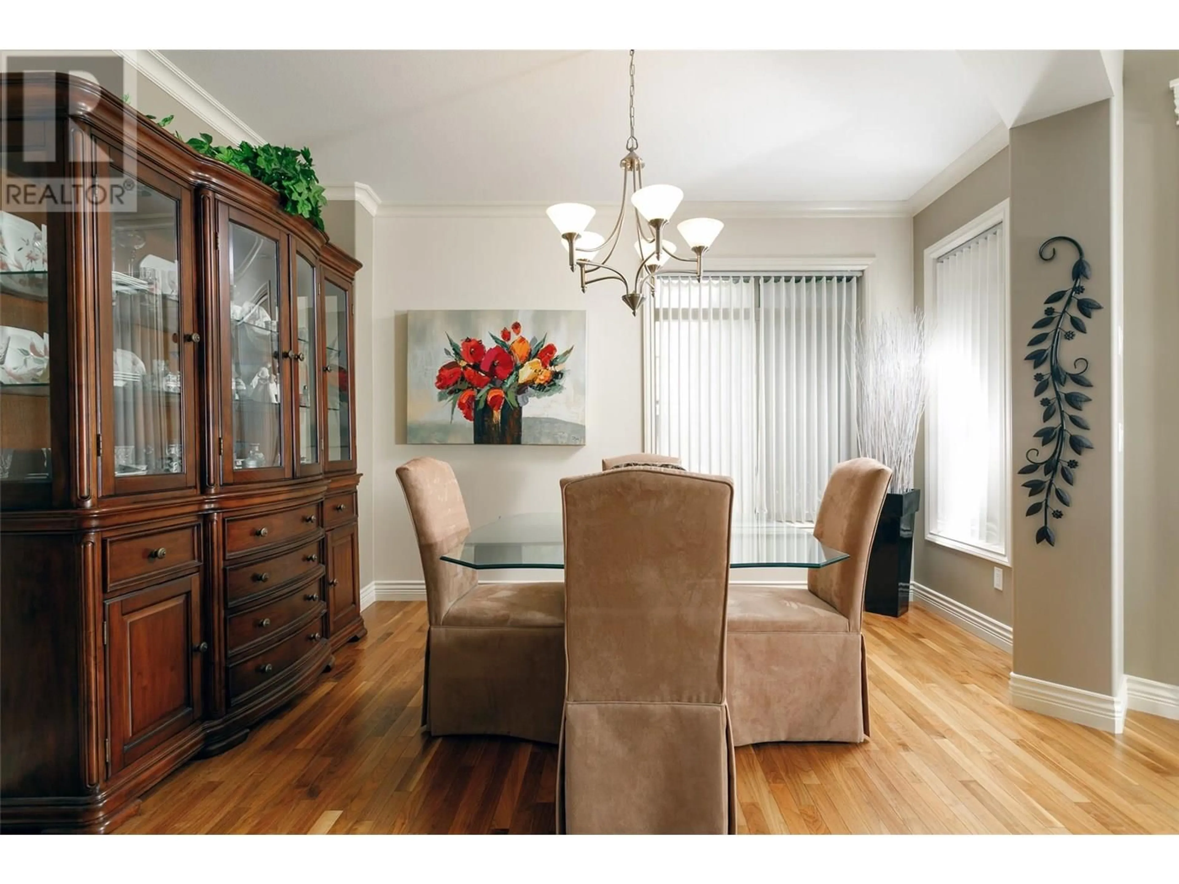 Dining room, wood/laminate floor for 636 SPRUCEVIEW PLACE SOUTH, Kelowna British Columbia V1V2P7