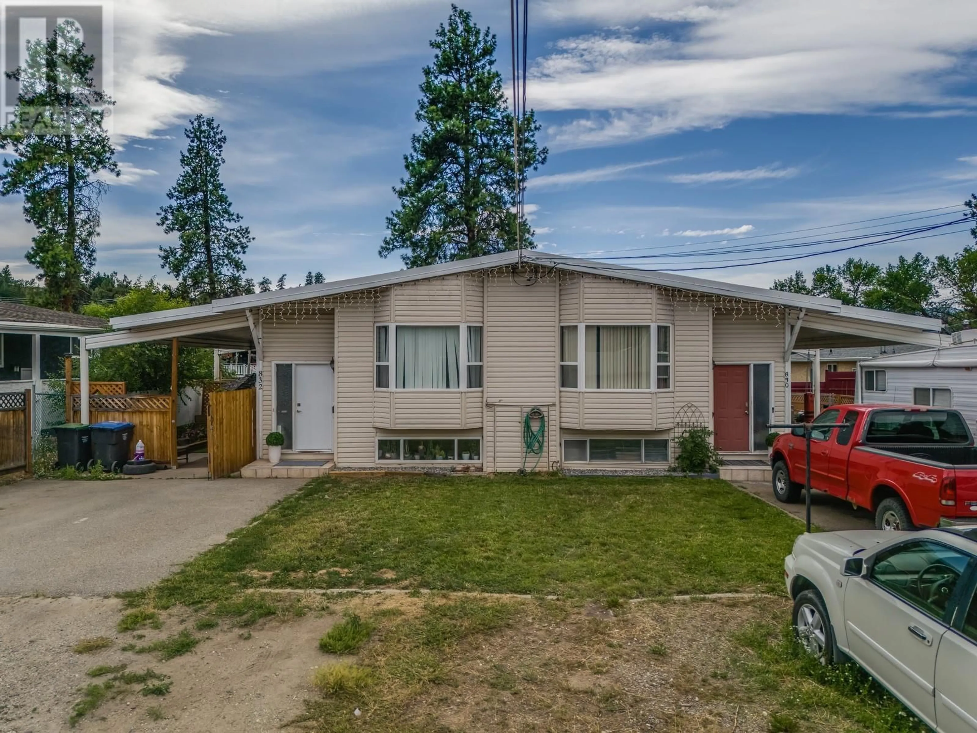 Home with vinyl exterior material, street for 830/832 IRMA ROAD, Kelowna British Columbia V1X3Z9