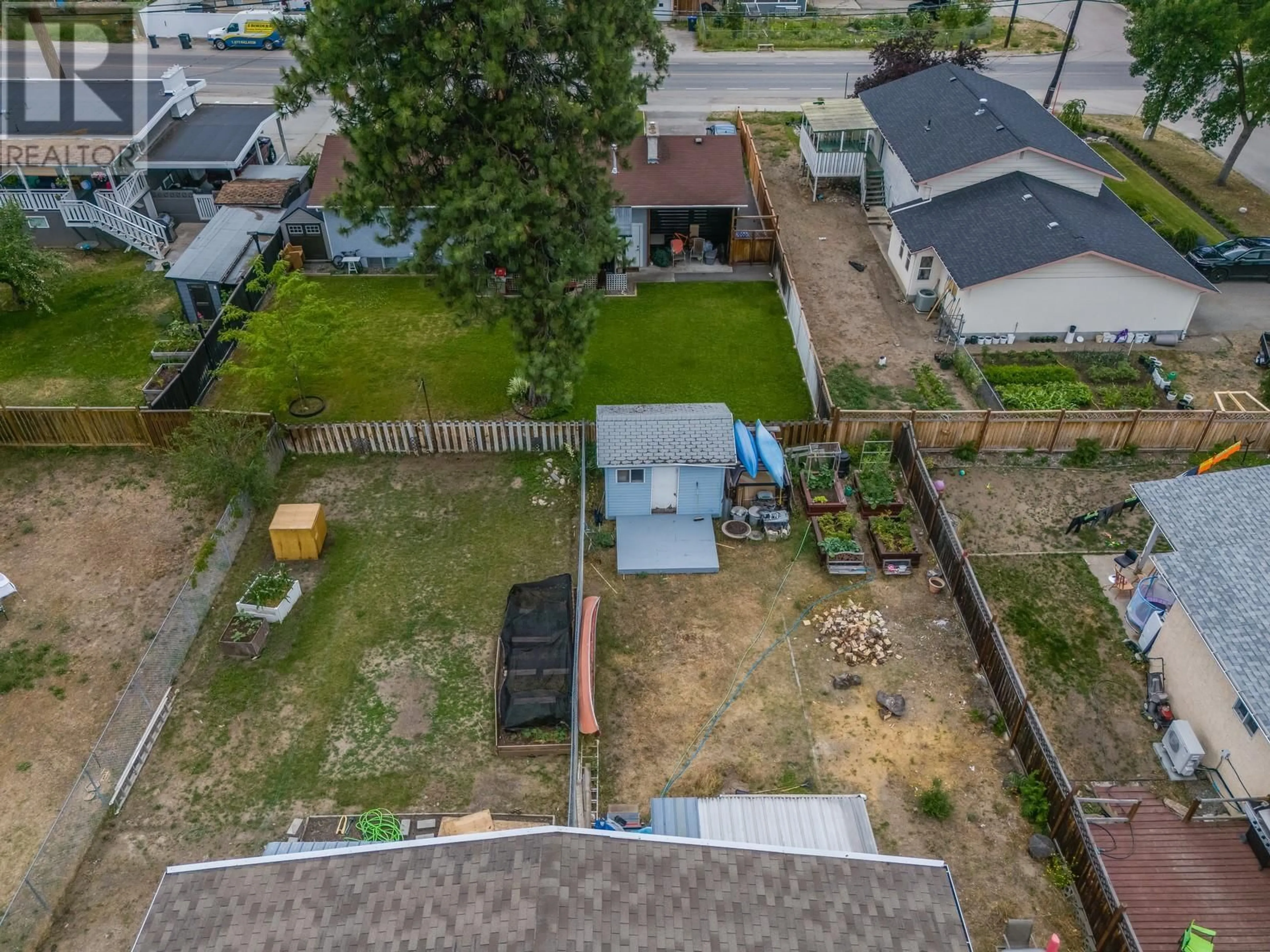 A pic from outside/outdoor area/front of a property/back of a property/a pic from drone, unknown for 830/832 IRMA ROAD, Kelowna British Columbia V1X3Z9