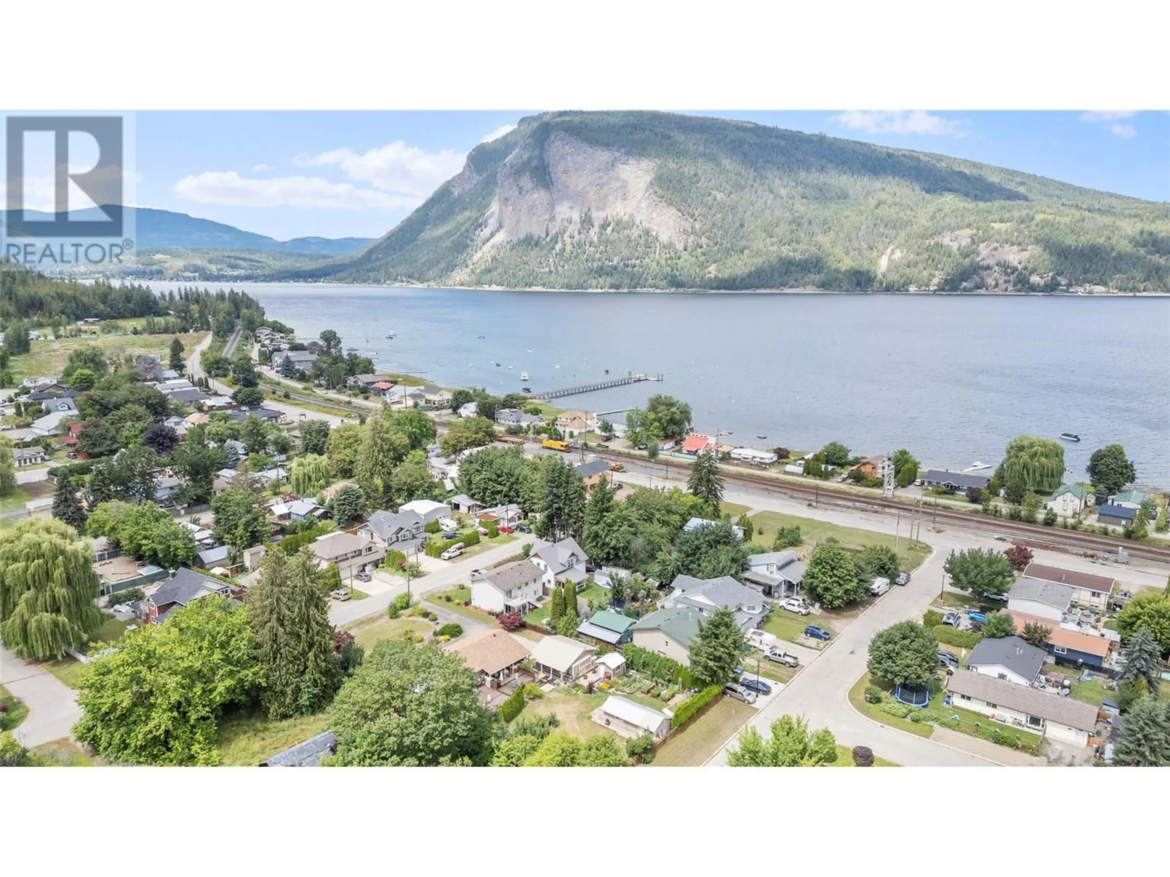 A pic from outside/outdoor area/front of a property/back of a property/a pic from drone, water/lake/river/ocean view for 7250 52 STREET NORTHEAST, Salmon Arm British Columbia V0E1K0