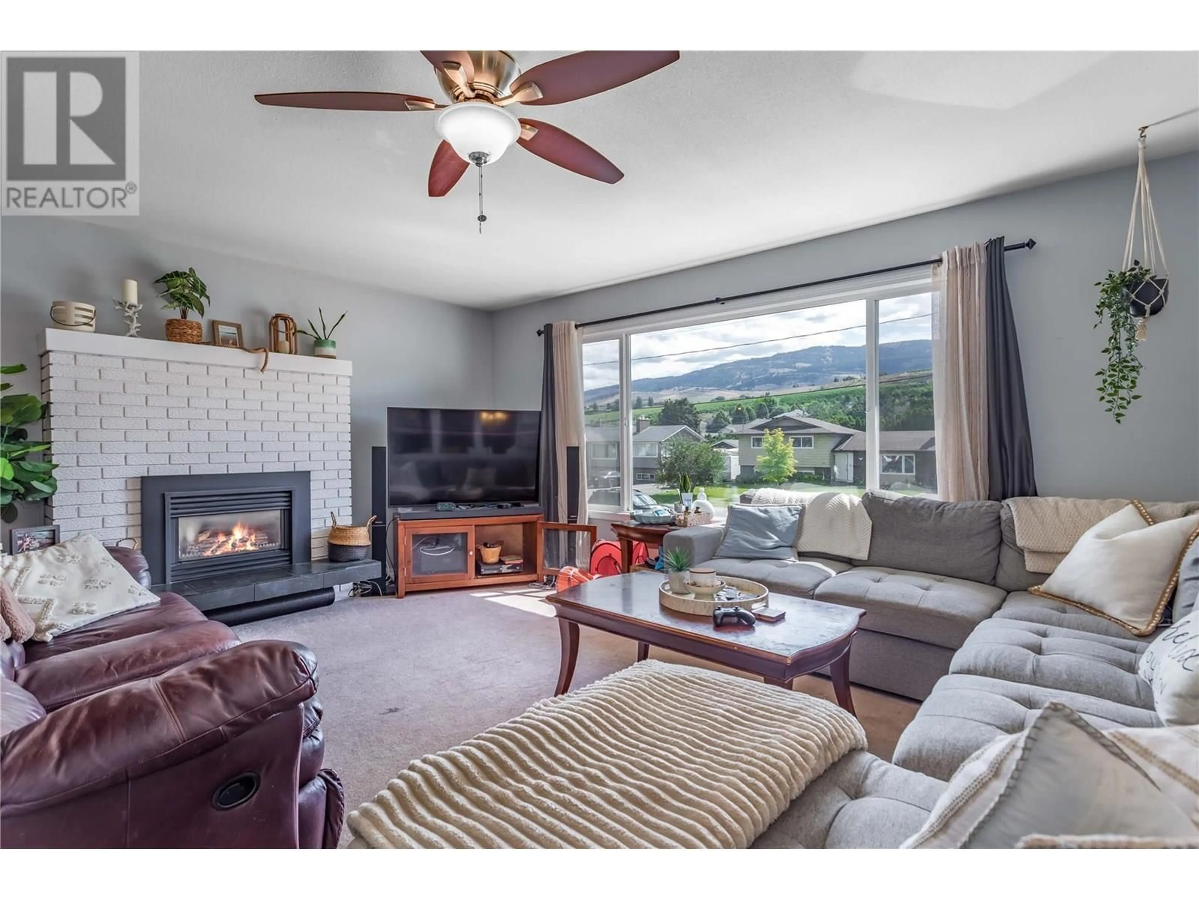 Living room with furniture, unknown for 430 MOLNAR ROAD, Kelowna British Columbia V1X5H6