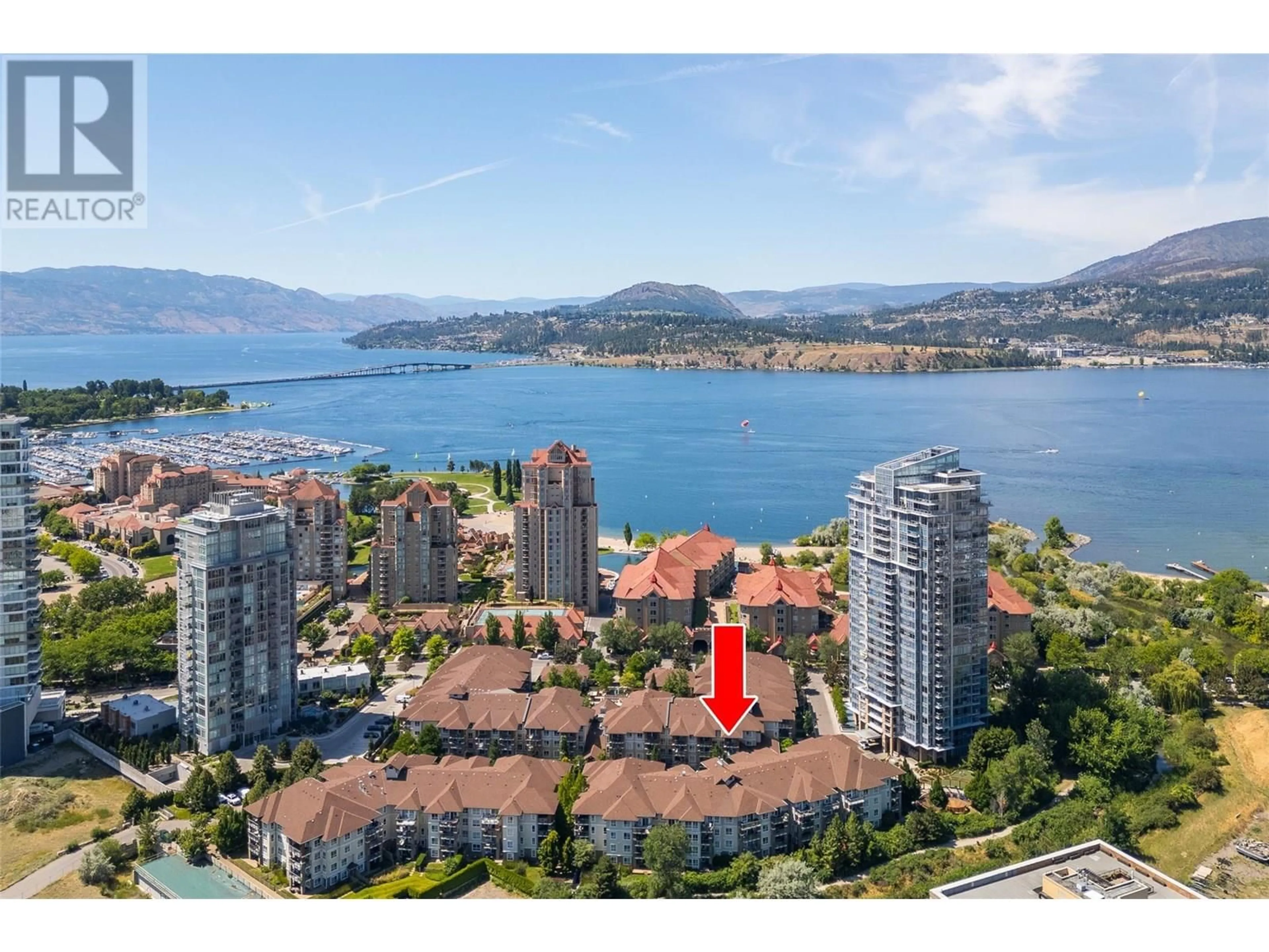 A pic from outside/outdoor area/front of a property/back of a property/a pic from drone, water/lake/river/ocean view for 319 - 1083 SUNSET DRIVE, Kelowna British Columbia V1Y9Z1