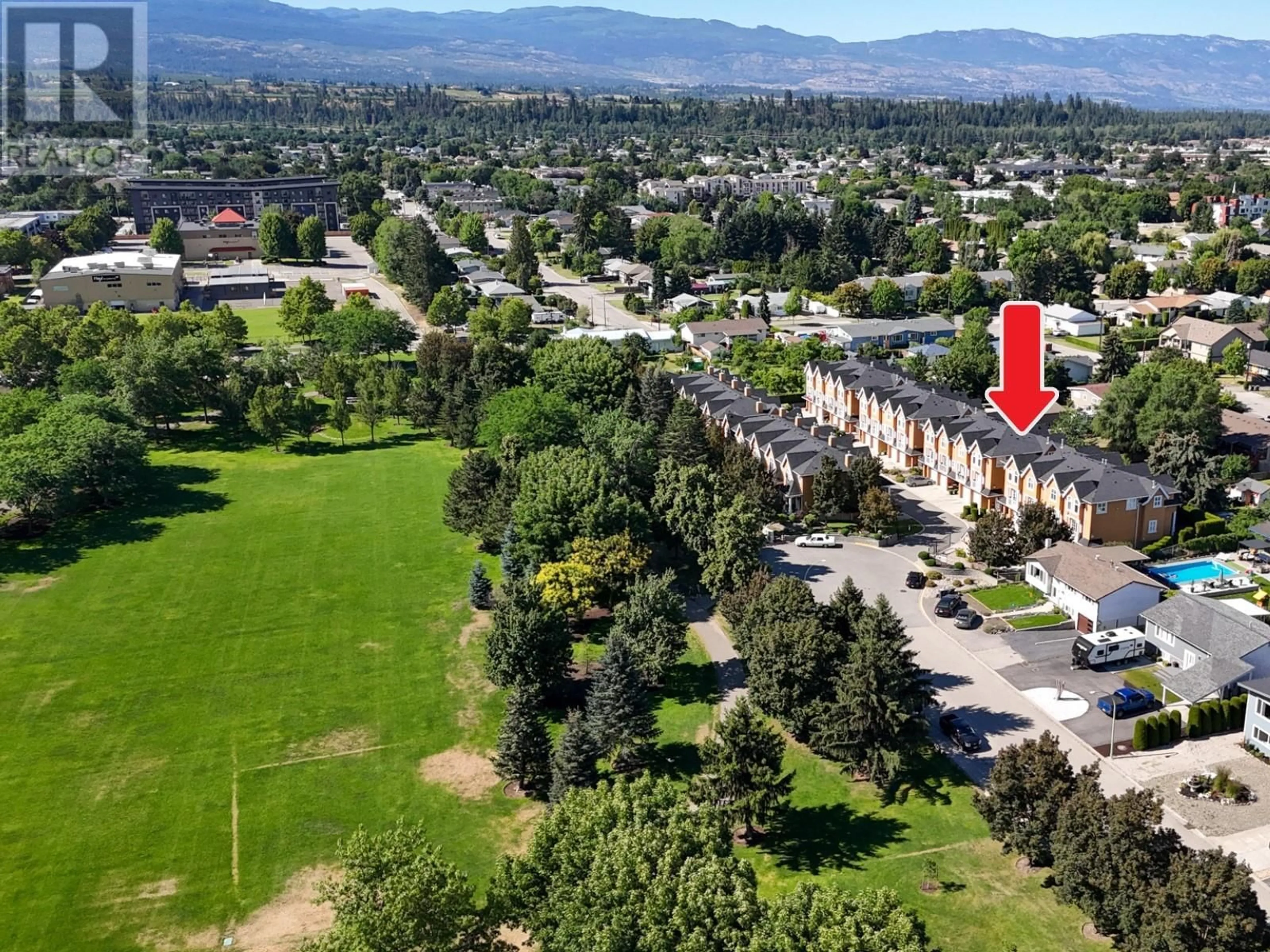 A pic from outside/outdoor area/front of a property/back of a property/a pic from drone, mountain view for 122 - 456 MCPHEE STREET, Kelowna British Columbia V1X8C5