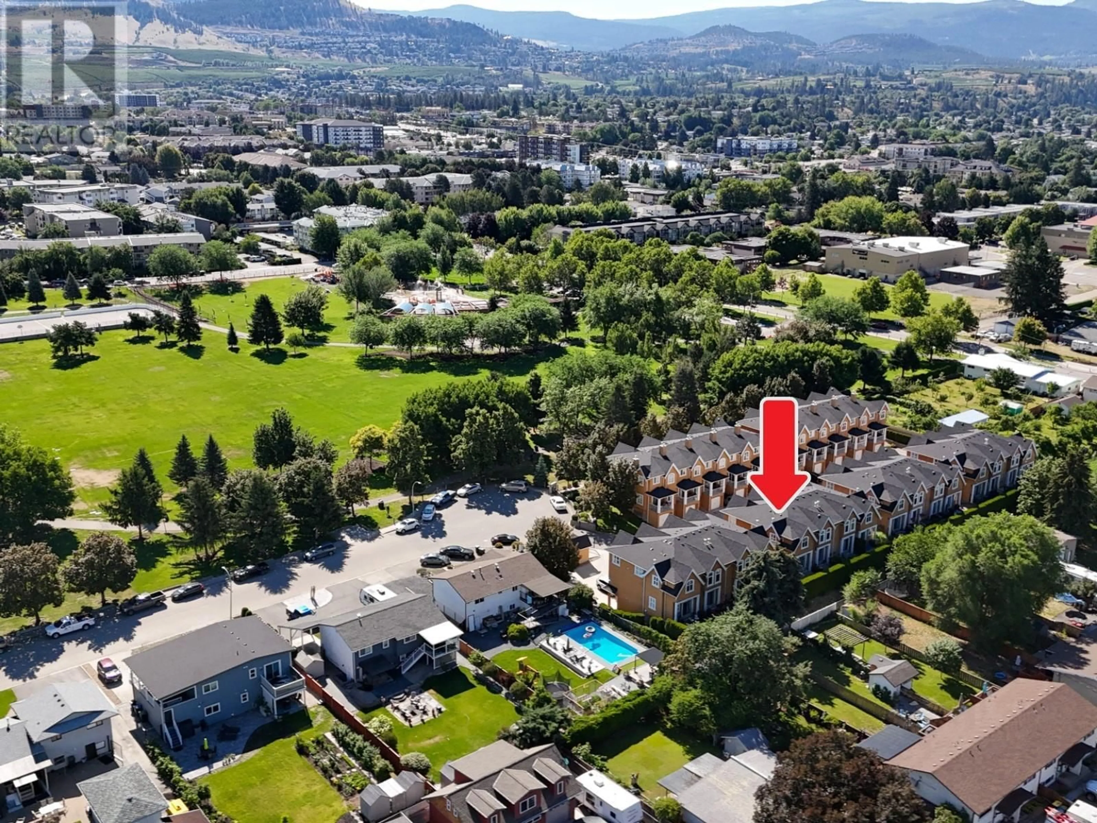 A pic from outside/outdoor area/front of a property/back of a property/a pic from drone, mountain view for 122 - 456 MCPHEE STREET, Kelowna British Columbia V1X8C5