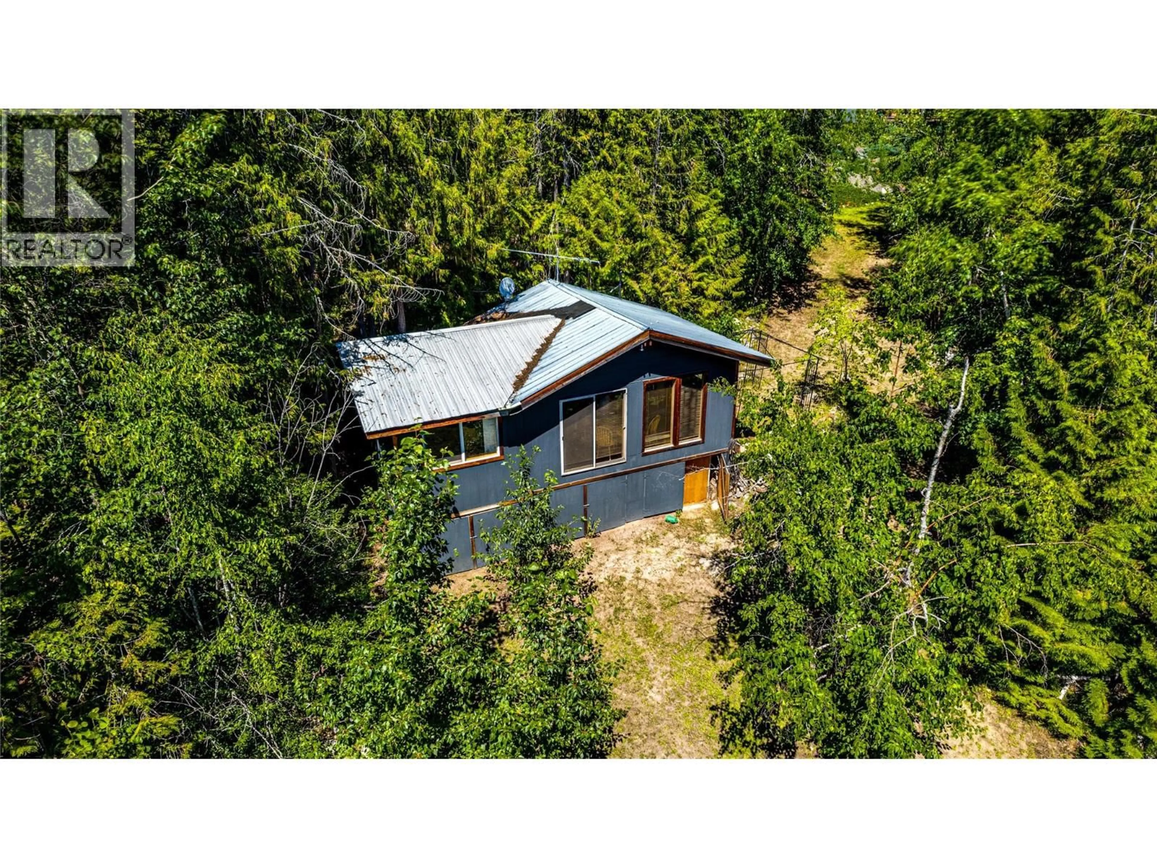 A pic from outside/outdoor area/front of a property/back of a property/a pic from drone, forest/trees view for 8450 SILVER STAR ROAD, Vernon British Columbia V1B3M7