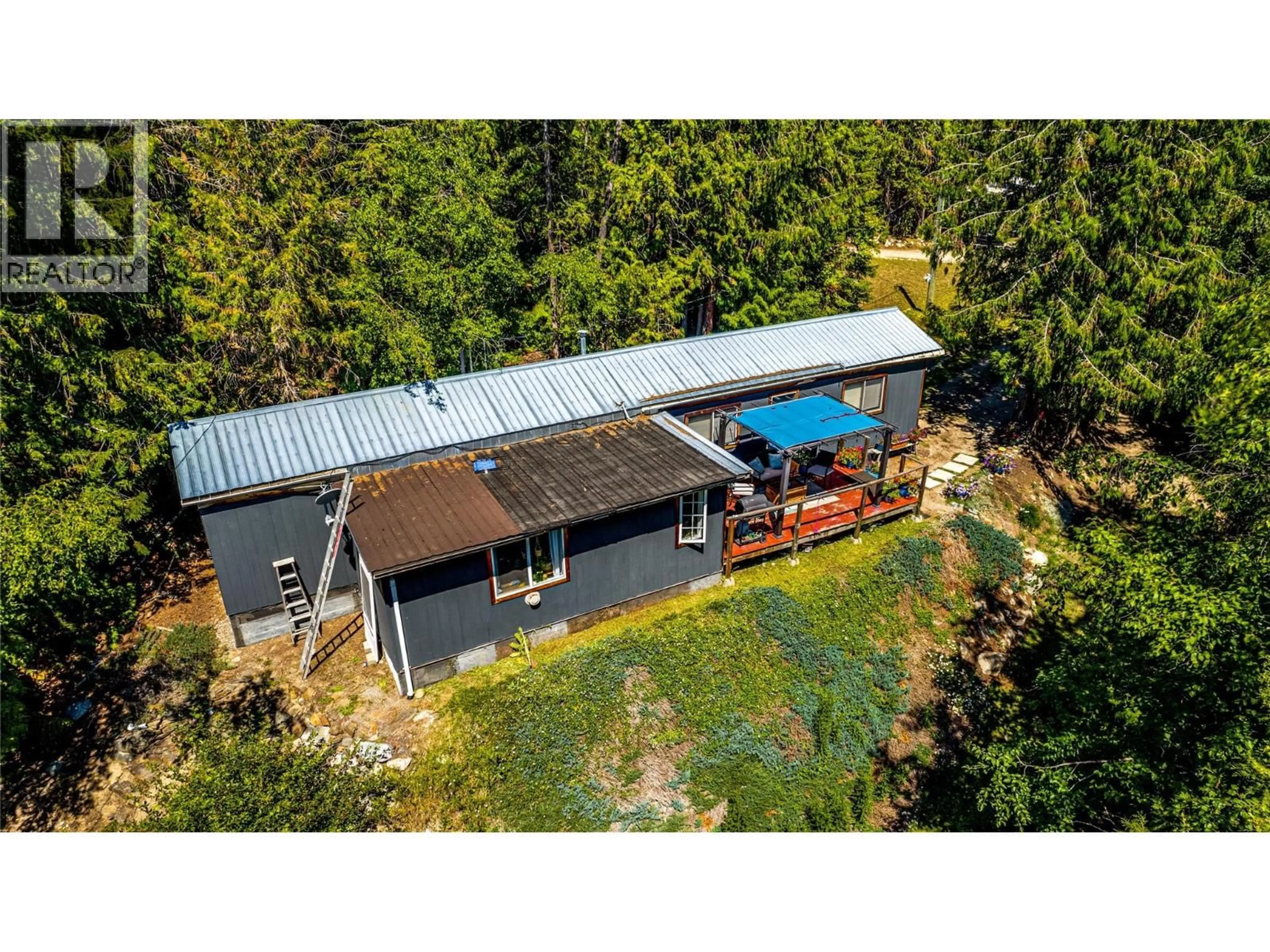 A pic from outside/outdoor area/front of a property/back of a property/a pic from drone, building for 8450 SILVER STAR ROAD, Vernon British Columbia V1B3M7