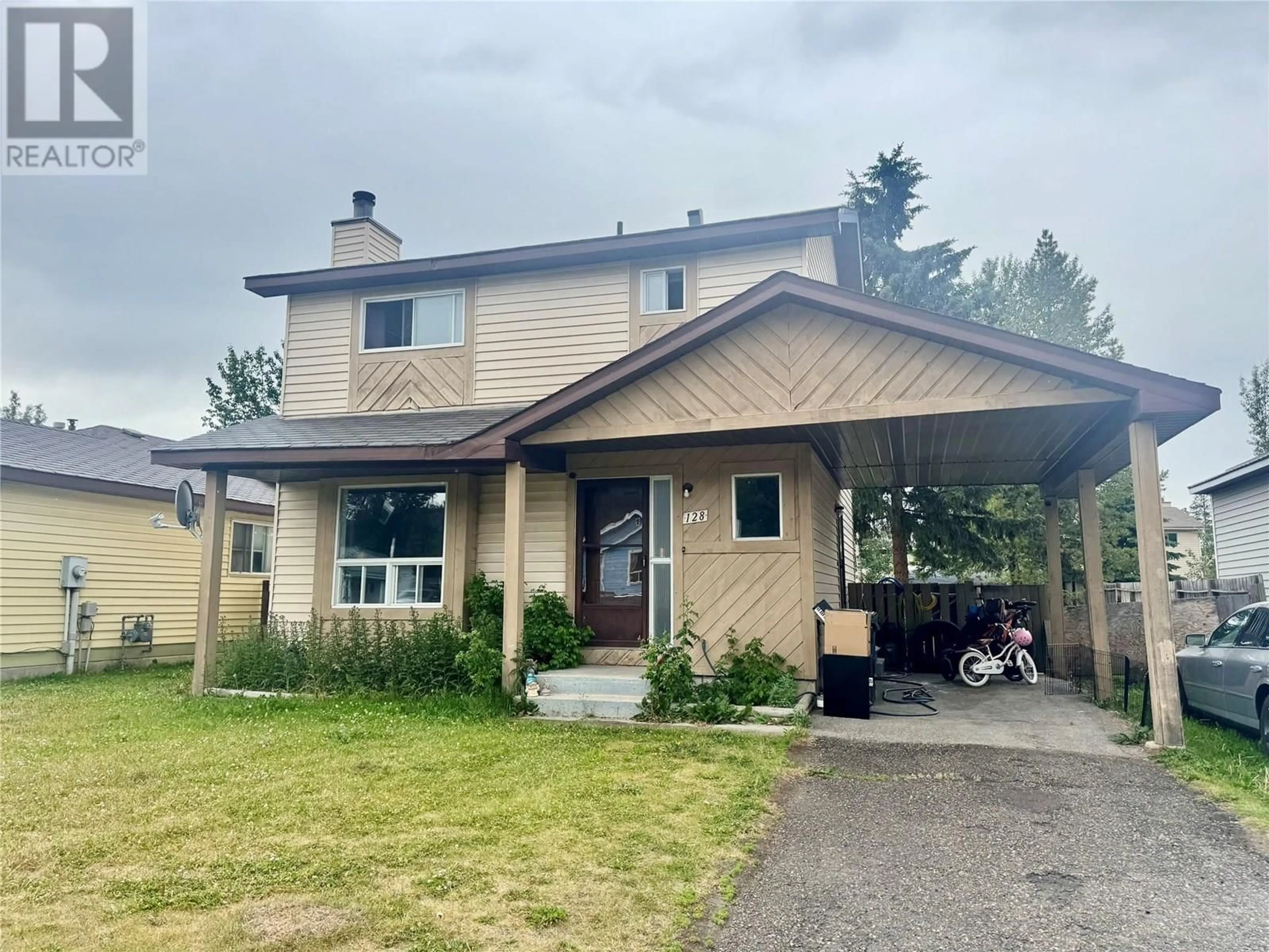 Home with vinyl exterior material, street for 128 FELLERS AVENUE, Tumbler Ridge British Columbia V0C2W0