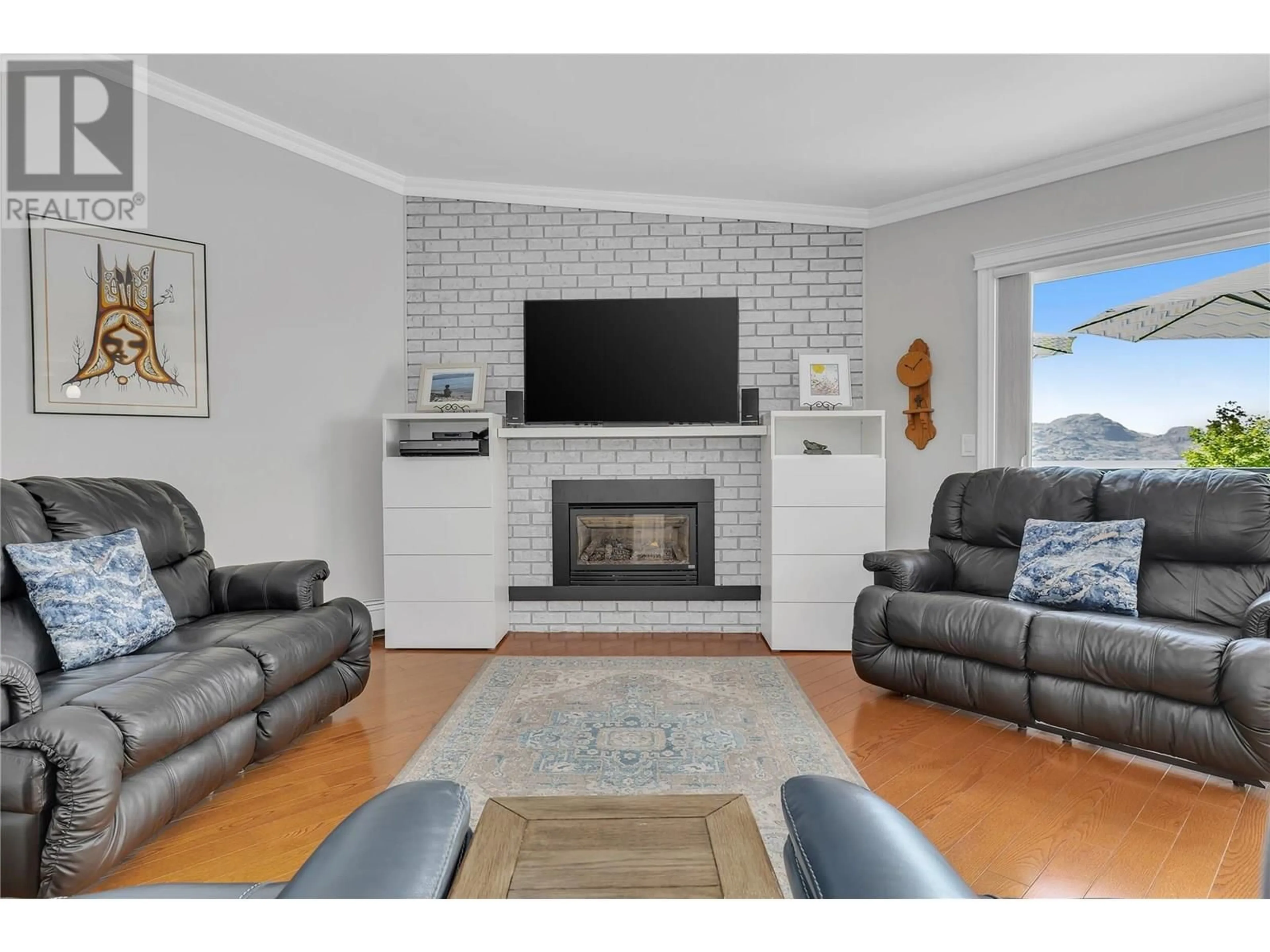Living room with furniture, unknown for 203 - 4340A BEACH AVENUE, Peachland British Columbia V0H1X6