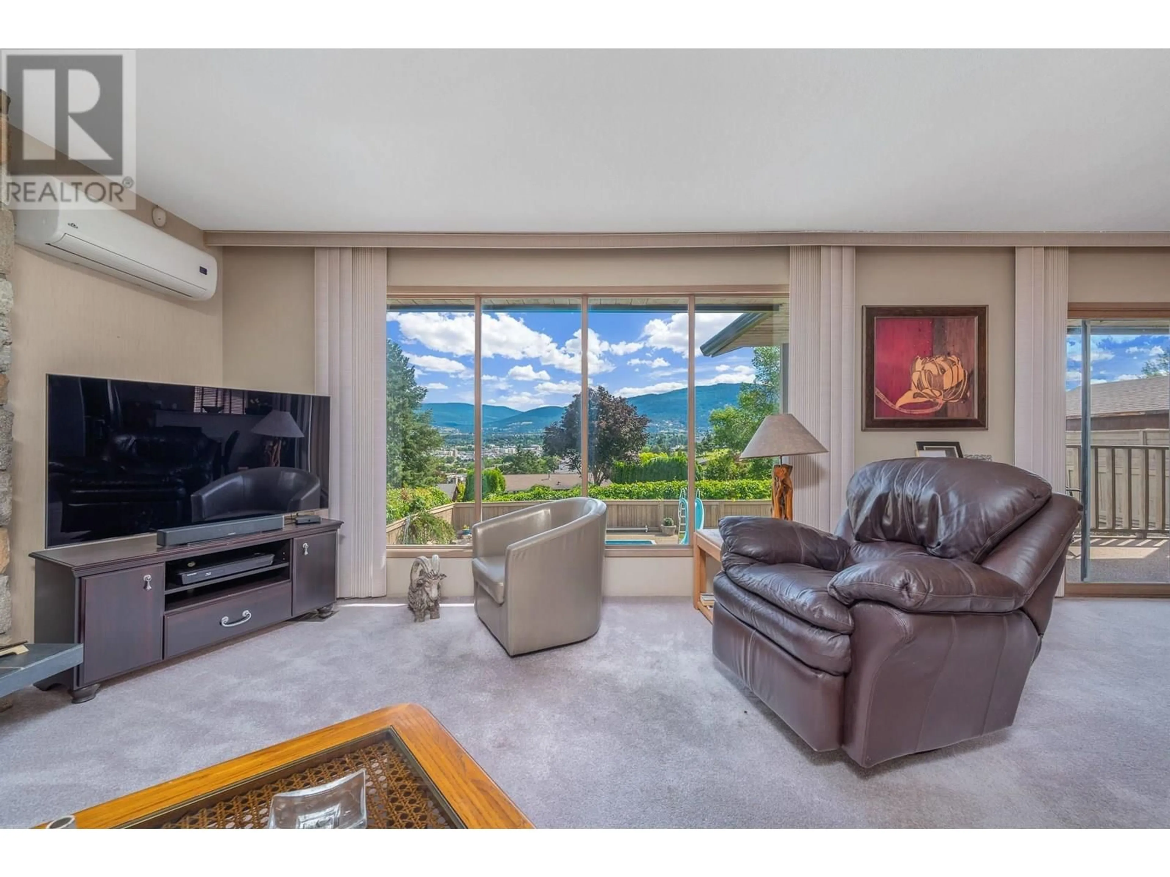Living room with furniture, unknown for 3921 15 CRESCENT, Vernon British Columbia V1T8B7