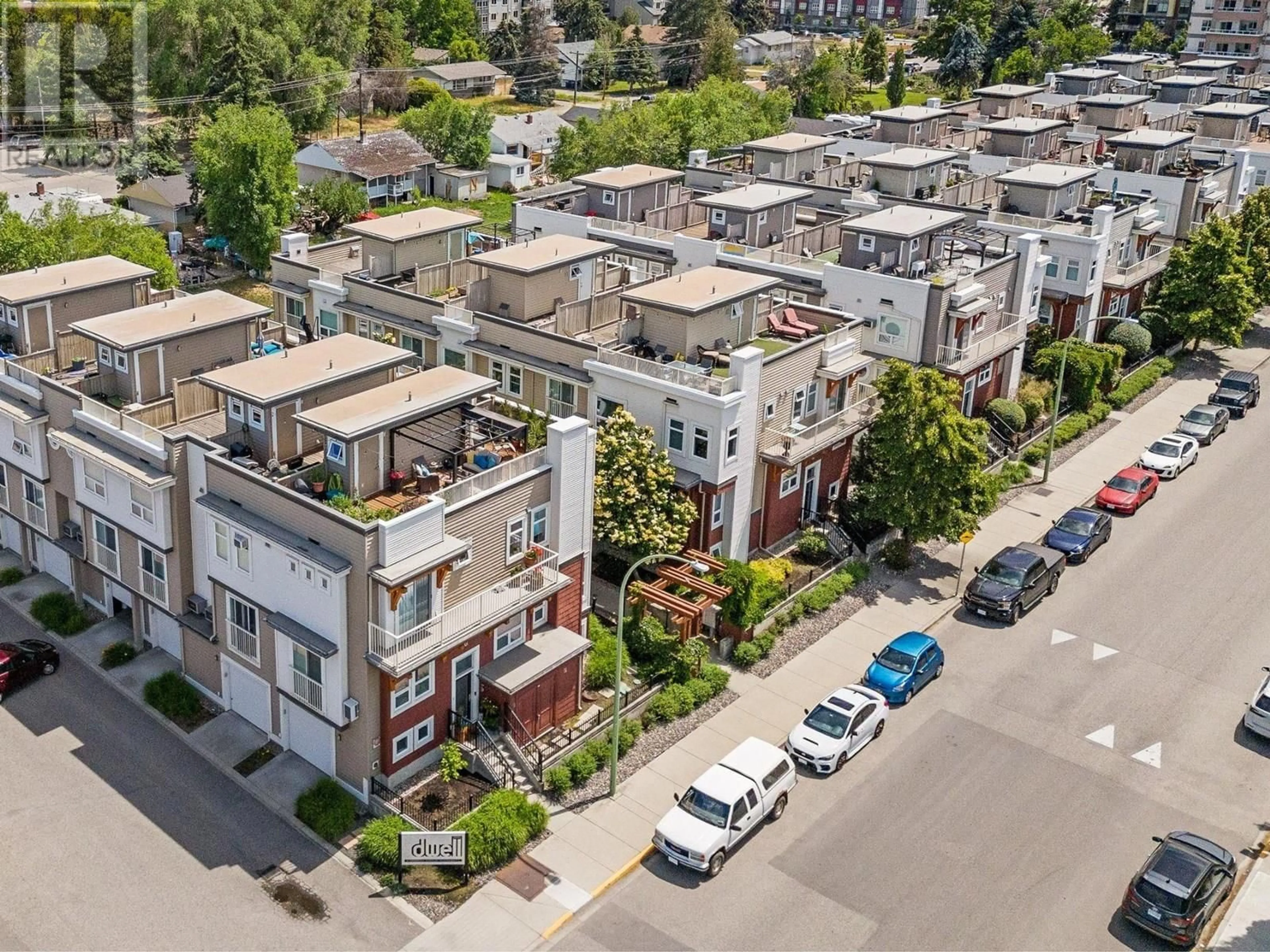 A pic from outside/outdoor area/front of a property/back of a property/a pic from drone, street for 3 - 1811 AMBROSI ROAD, Kelowna British Columbia V1Y4R9