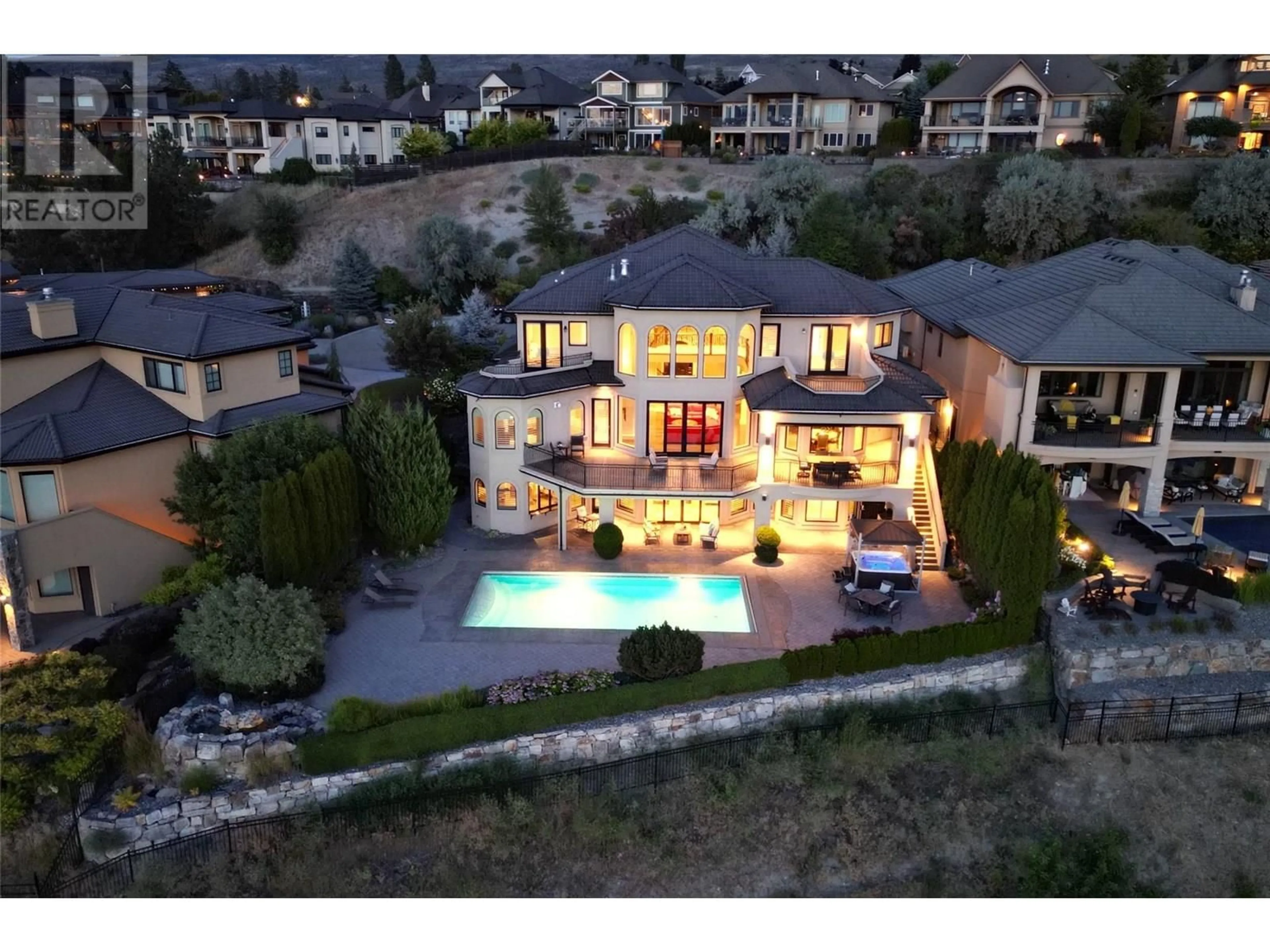 A pic from outside/outdoor area/front of a property/back of a property/a pic from drone, mountain view for 4860 TUSCANY LANE, Kelowna British Columbia V1W5H3